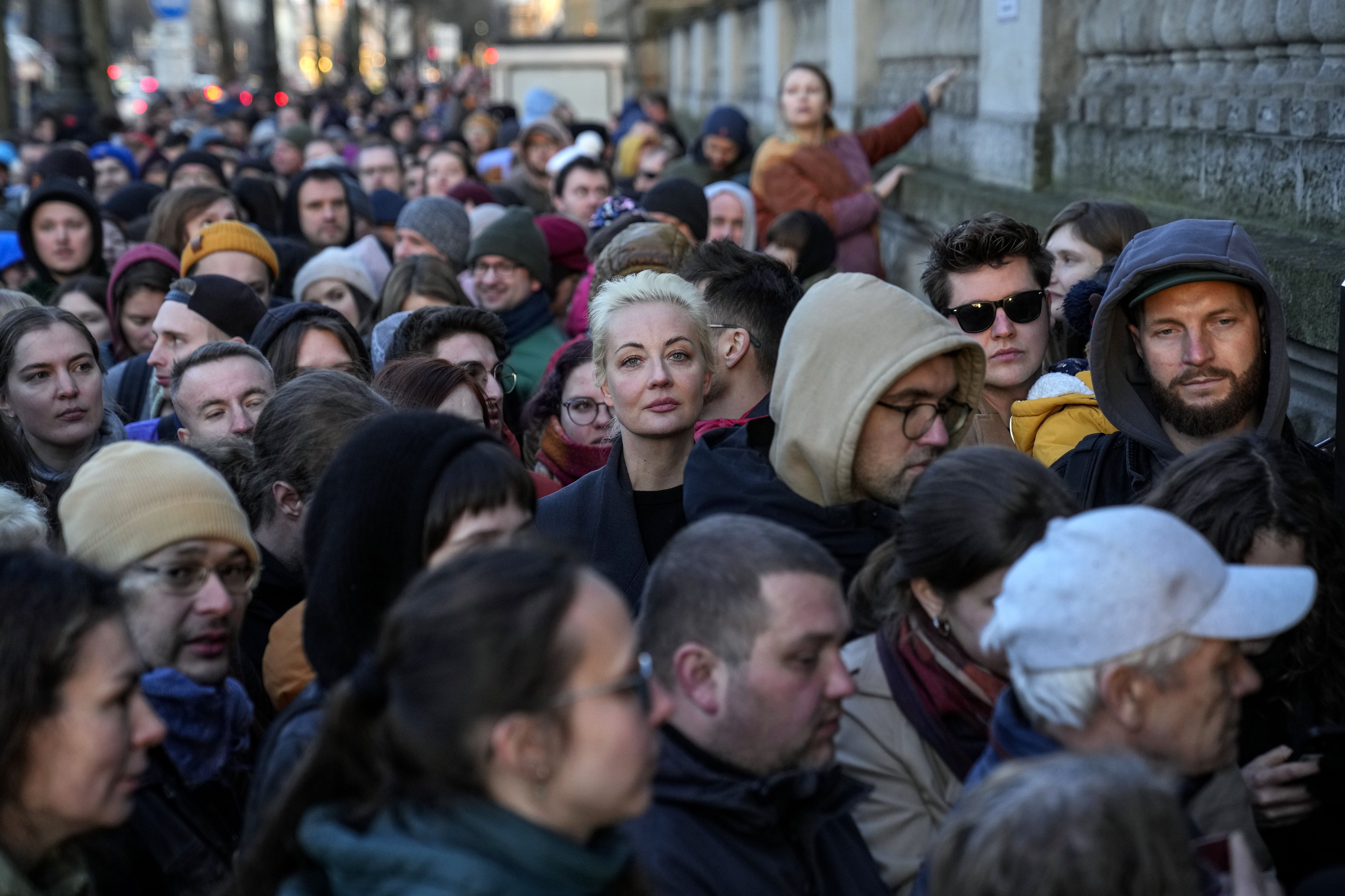 Yulia Navalnaya, center, widow of Alexey Navalny, stands in a queue with other voters at a polling station near the Russian embassy in Berlin, after noon local time, on Sunday, March 17, 2024. The Russian opposition has called on people to head to polling stations at noon on Sunday in protest as voting takes place on the last day of a presidential election that is all but certain to extend President Vladimir Putin's rule after he clamped down on dissent. AP can't confirm that all the voters seen at the polling station at noon were taking part in the opposition protest.