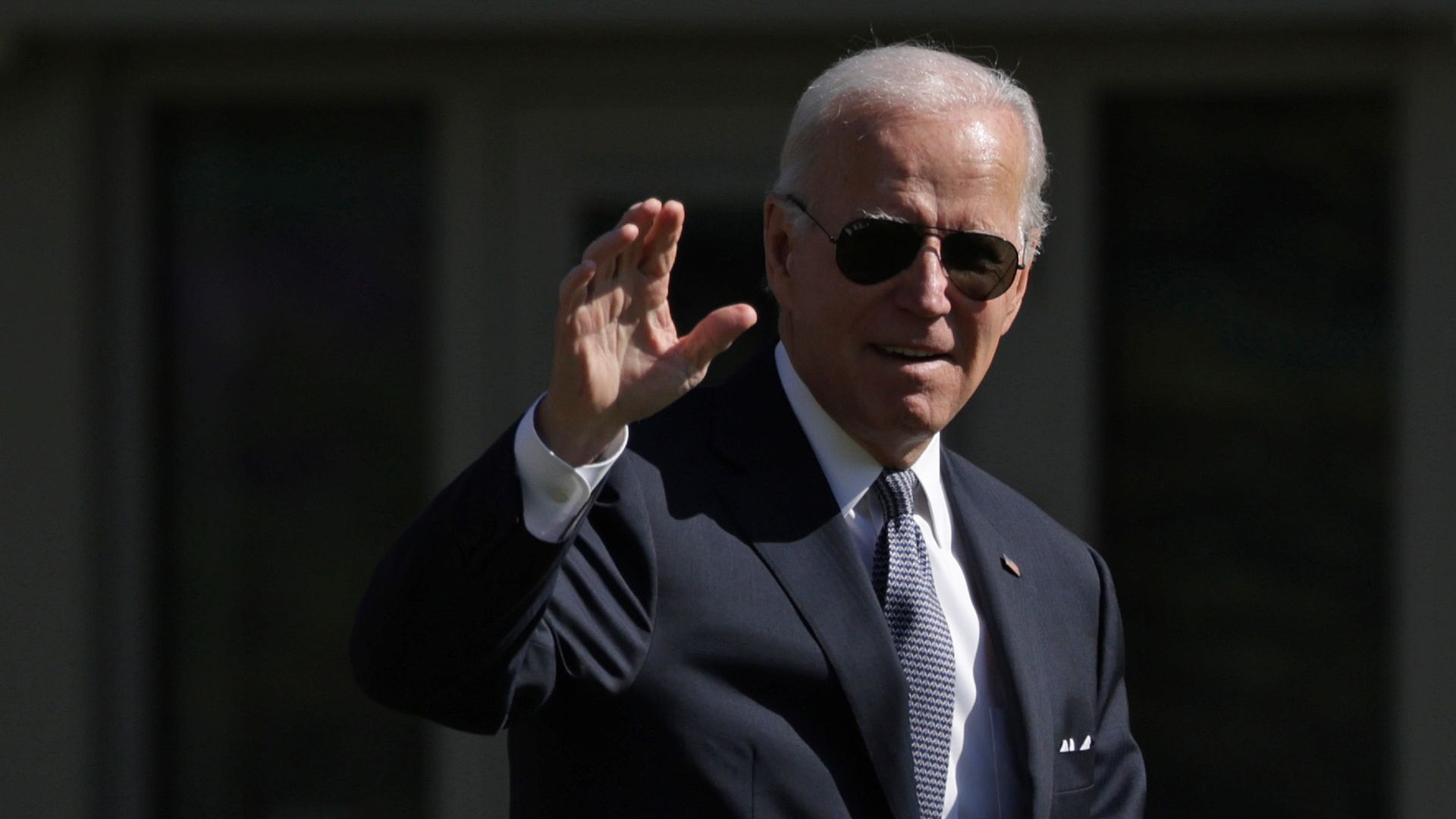 President Joe Biden waves prior to a Marine One departure from the White House.