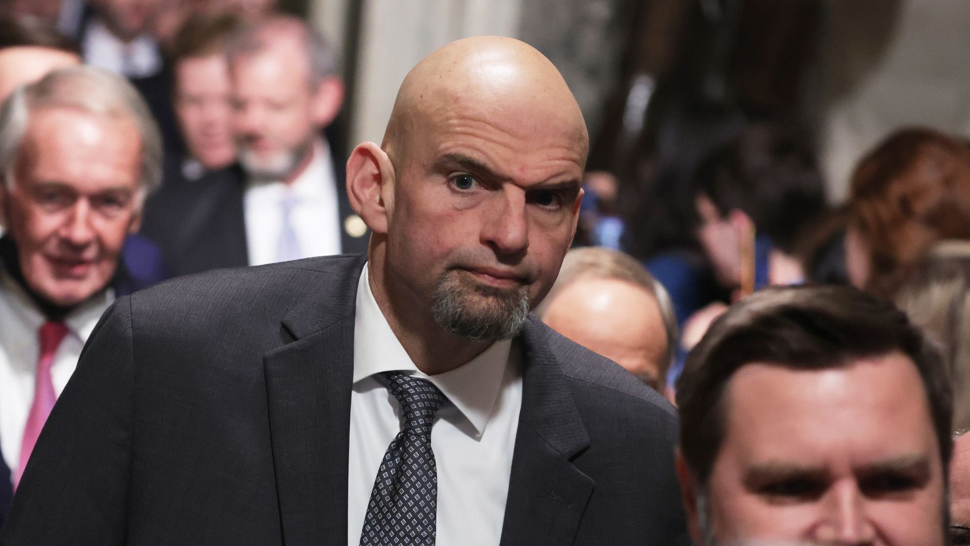 Sen. John Fetterman (D-PA) walks through the Statuary Hall of the U.S. Capitol prior to President Joe Biden’s State of the Union address on Tuesday.