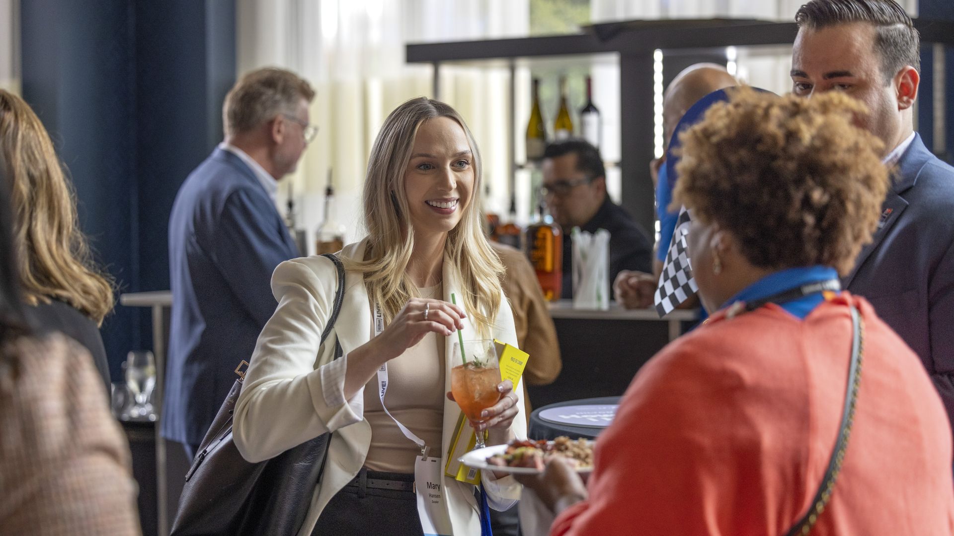 People mingling at a work event