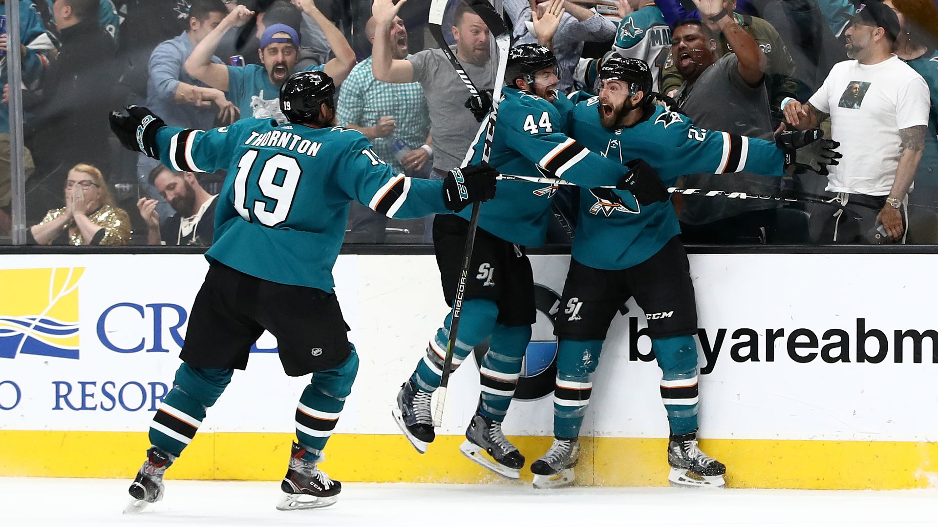San Jose Sharks players celebrate the game-winning goal