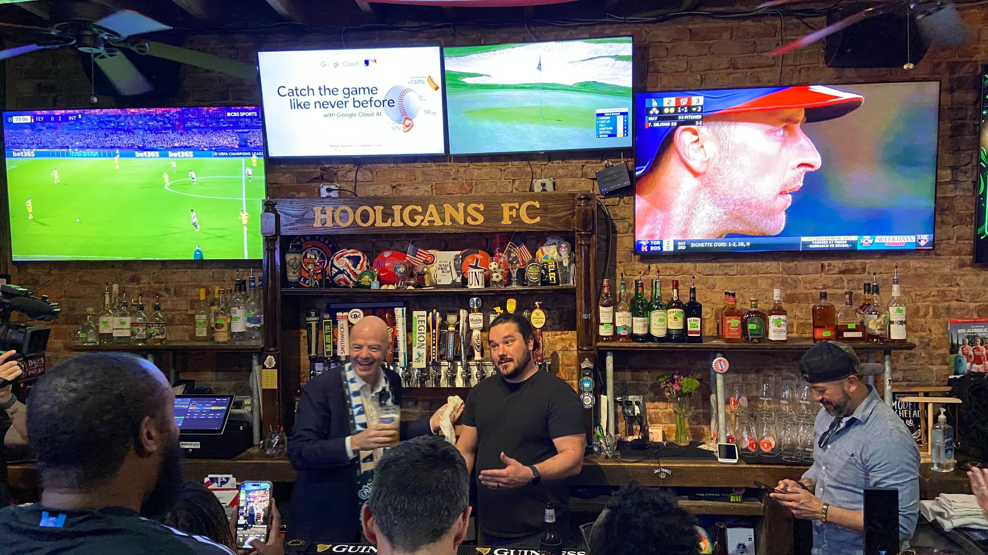 FIFA president Gianni Infantino met with local soccer fans at Hooligans Monday night.