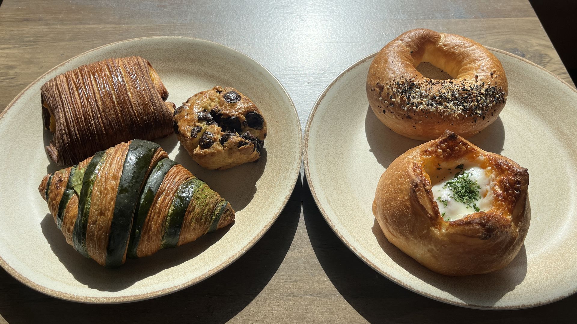 Assorted Japanese pastries on plates. 