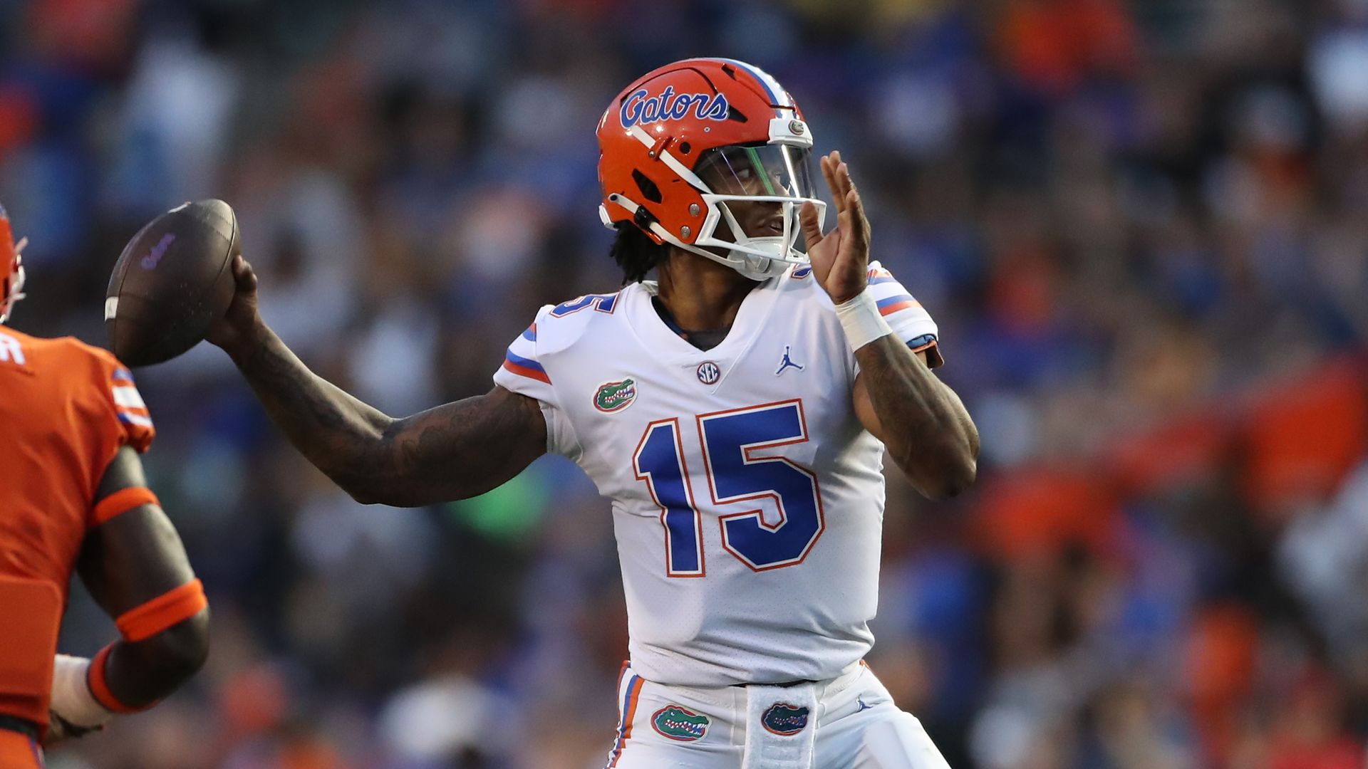 Photo of Anthony Richardson holding a football in his right hand about to throw