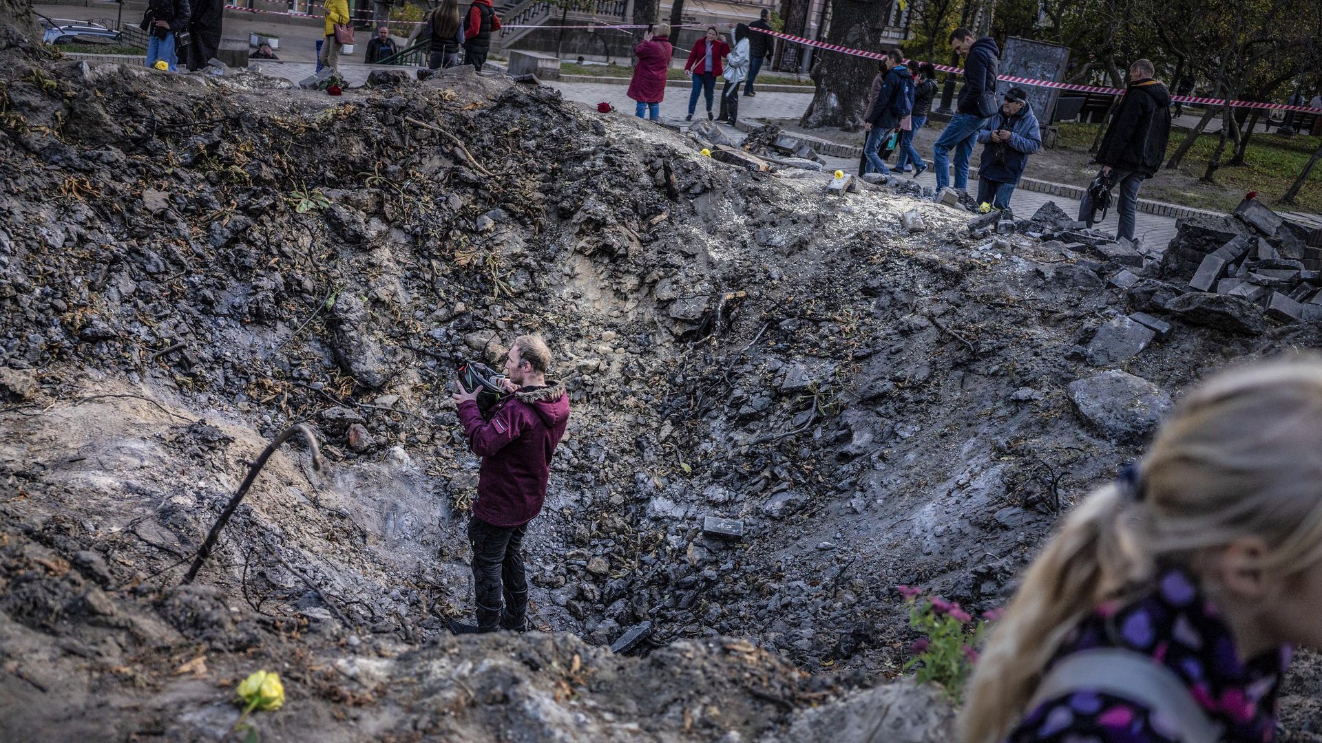 Ukrainians visit the crater