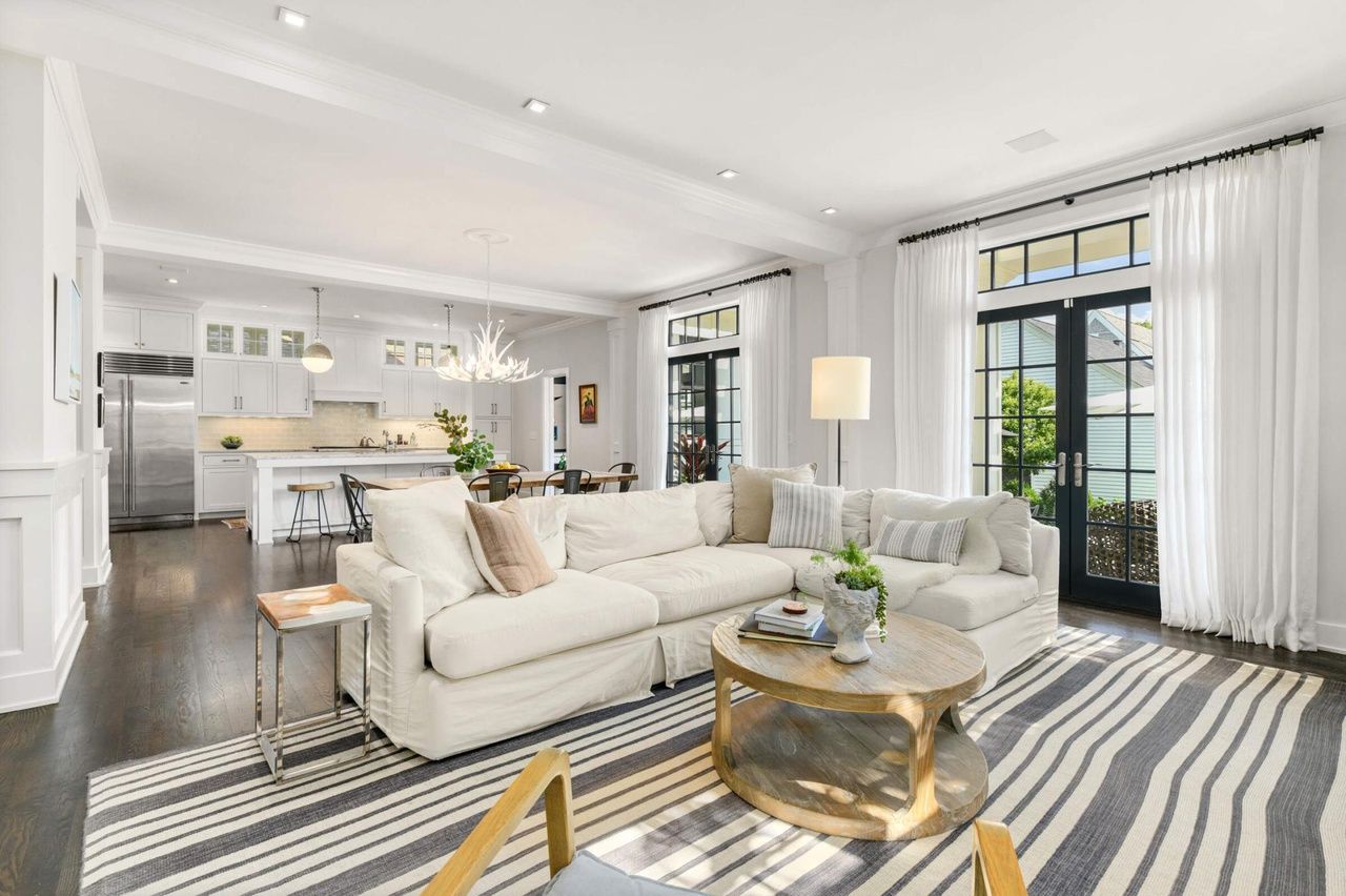 living room two with view of kitchen and eat-in area