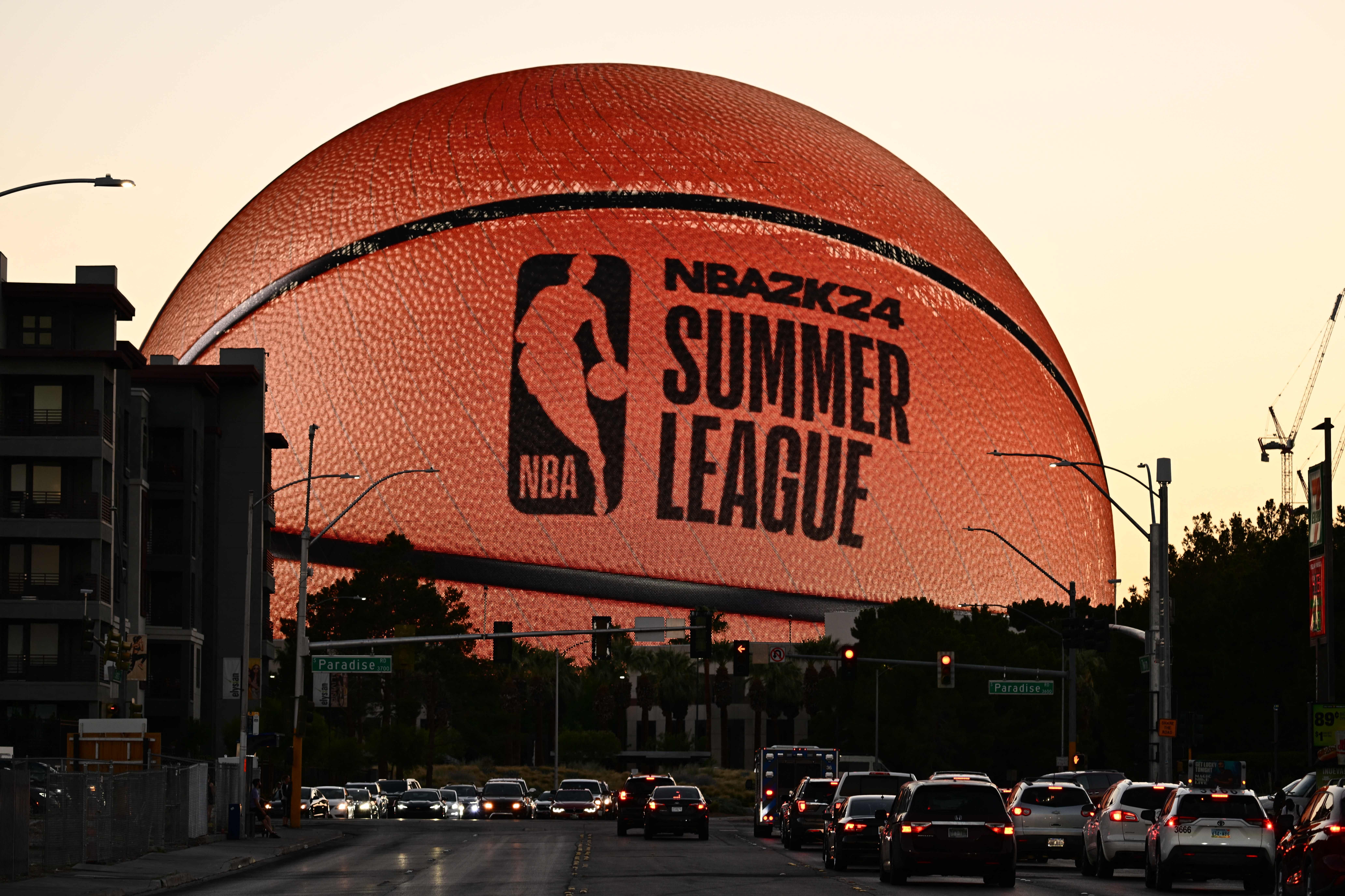 The MSG (Madison Square Garden) Sphere, new music entertainment arena, is lit up as a basketball to celebrate the 2023 NBA Summer League in Las Vegas, Nevada, on July 9, 2023.