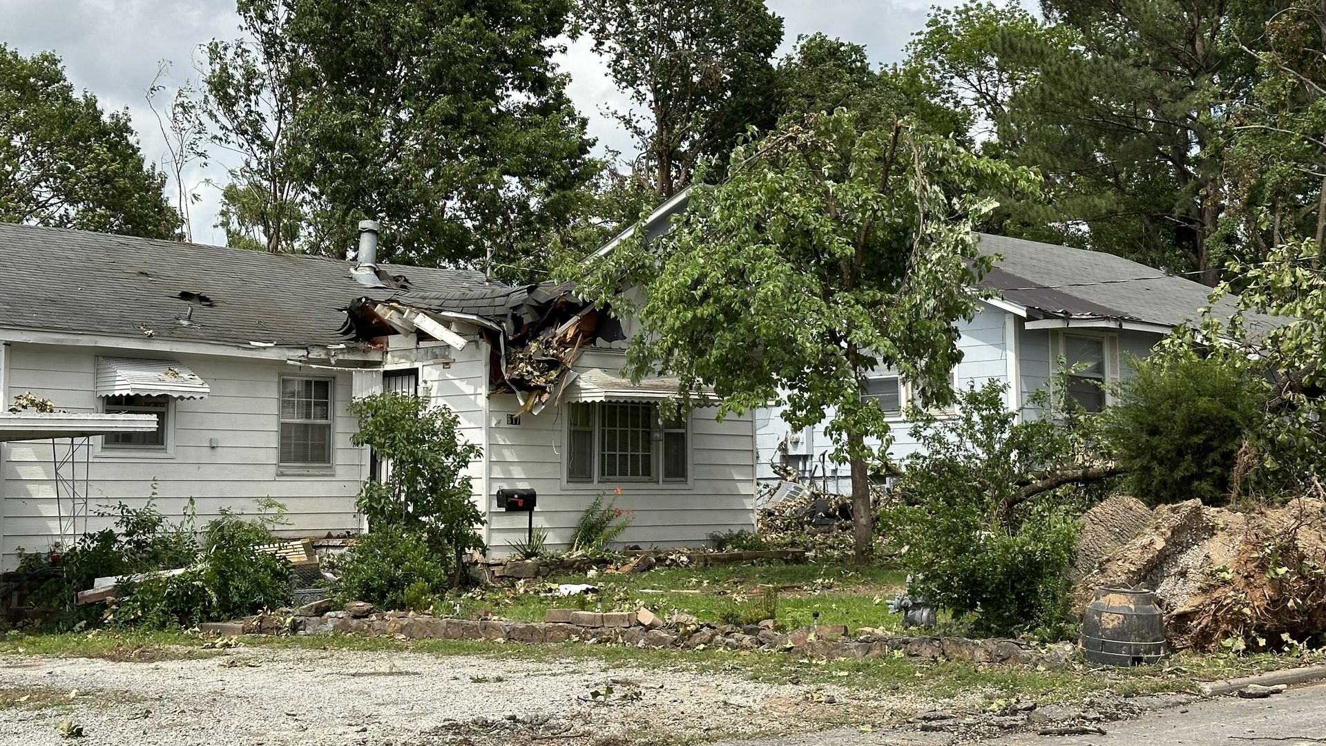 damaged home in Rogers
