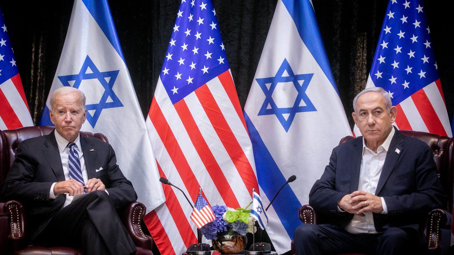 US President Joe Biden (L), sits with Israeli Prime Minister Benjamin Netanyahu, at the start of the Israeli war cabinet meeting, in Tel Aviv on October 18, 2023,