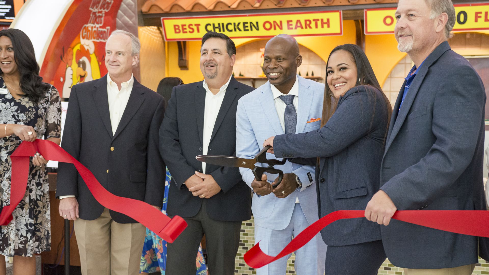 Javier Rodriquez and his wife, Angelica Torres, cut the ribbon on their new location.
