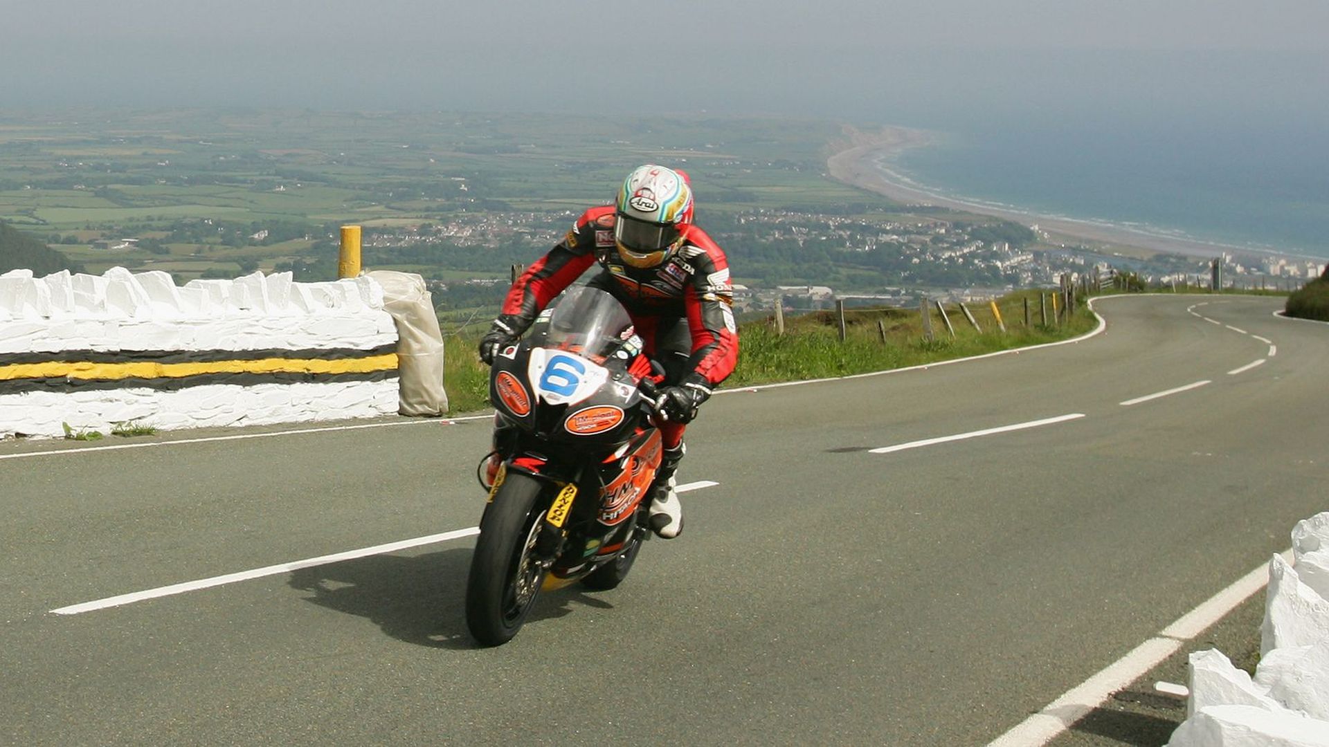 A racer on a motorcycle in the 2007 Isle of Man TT.