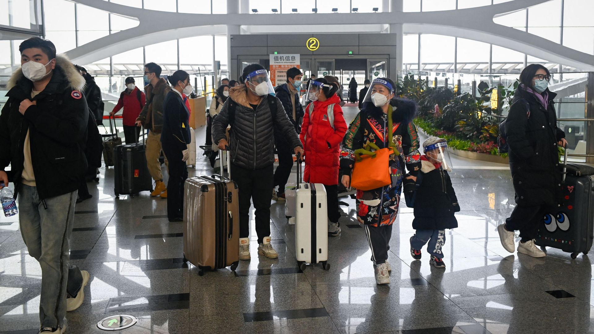  Passengers prepare to check in at Daxing International airport in Beijing on January 19.