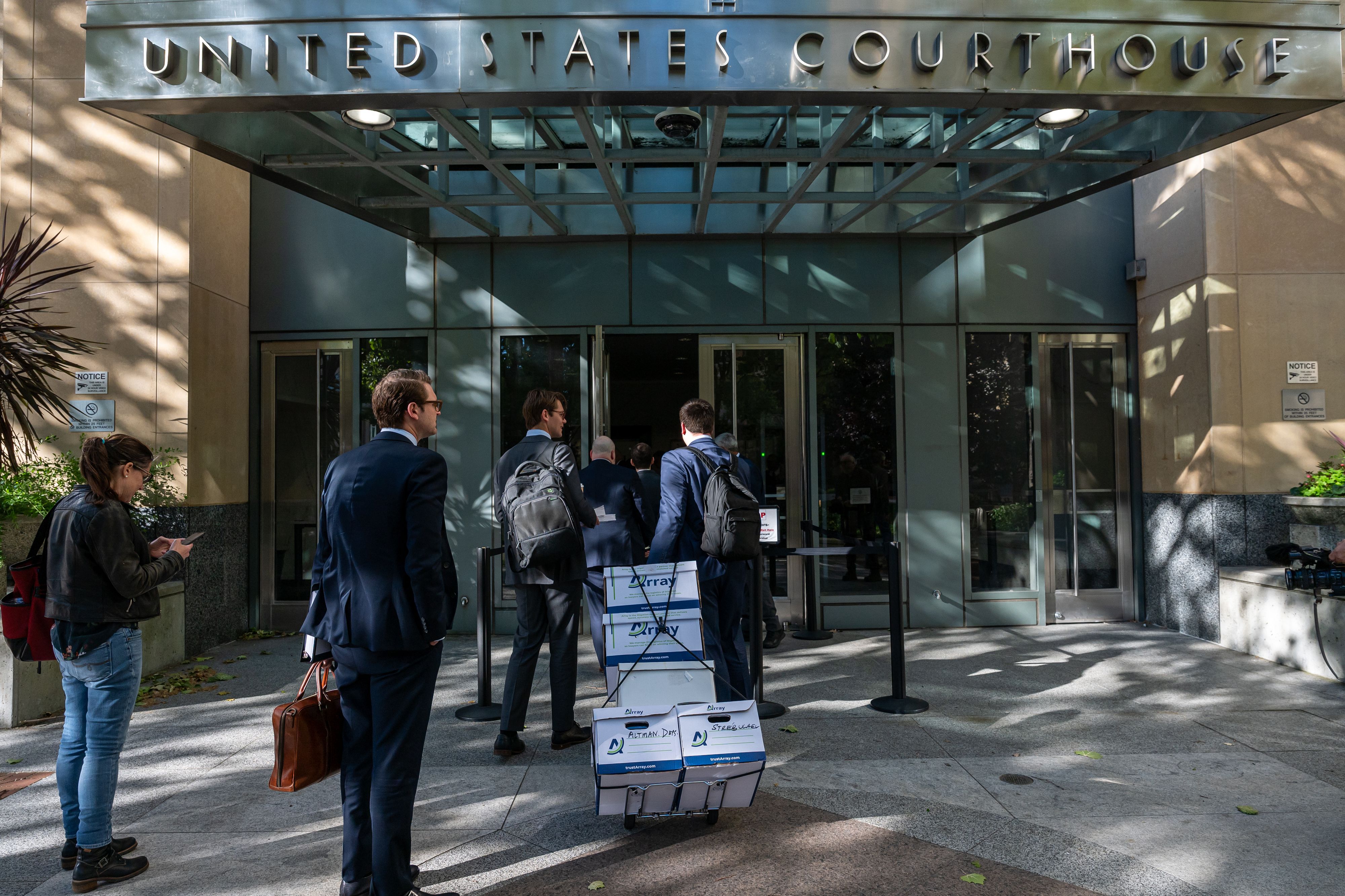 Exhibit boxes outside federal court in Oakland, California, US, on Monday, May 18, 2026. Elon Musk is suing OpenAI and Microsoft Corp. over claims that the startup abandoned its founding mission when it took billions of dollars in backing from the software stalwart and planned its restructuring. Pho