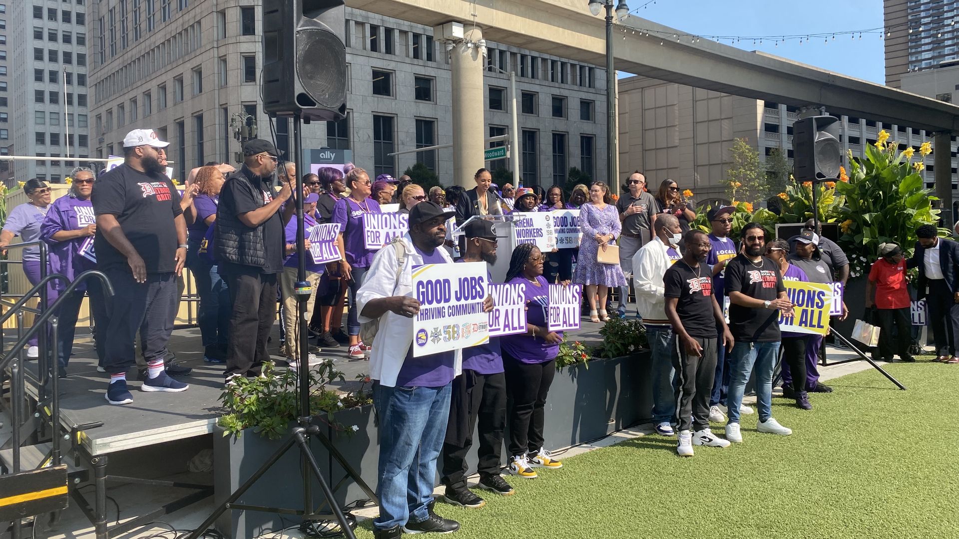 Workers and other SEIU members gather to support the launch of a survey of arena worker conditions. They are standing outside city hall.
