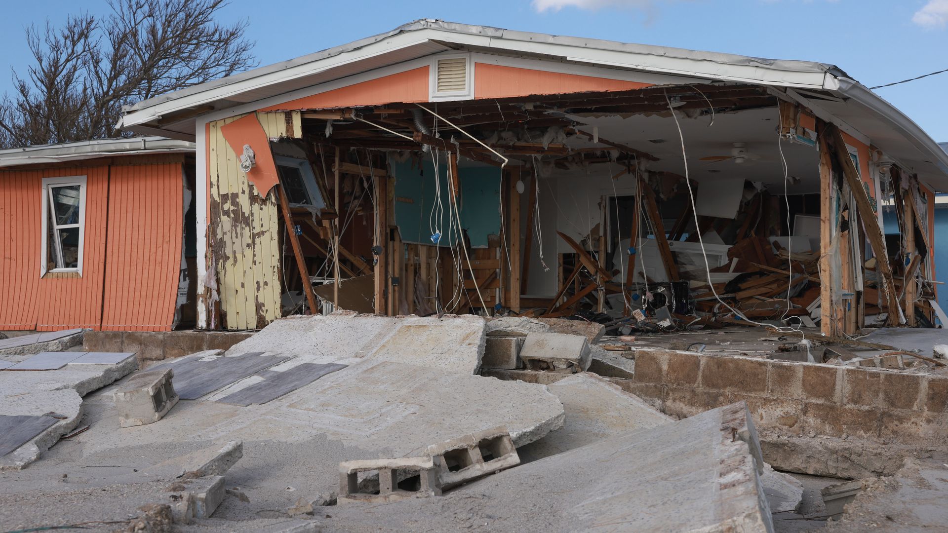 MANASOTA KEY, FLORIDA - OCTOBER 13: A home lays in ruins on October 13, 2024 in Manasota Key, Florida. People continue recovering following the storm that made landfall as a Category 3 hurricane in the Siesta Key area of Florida on October 9th, causing damage and flooding throughout Central Florida.