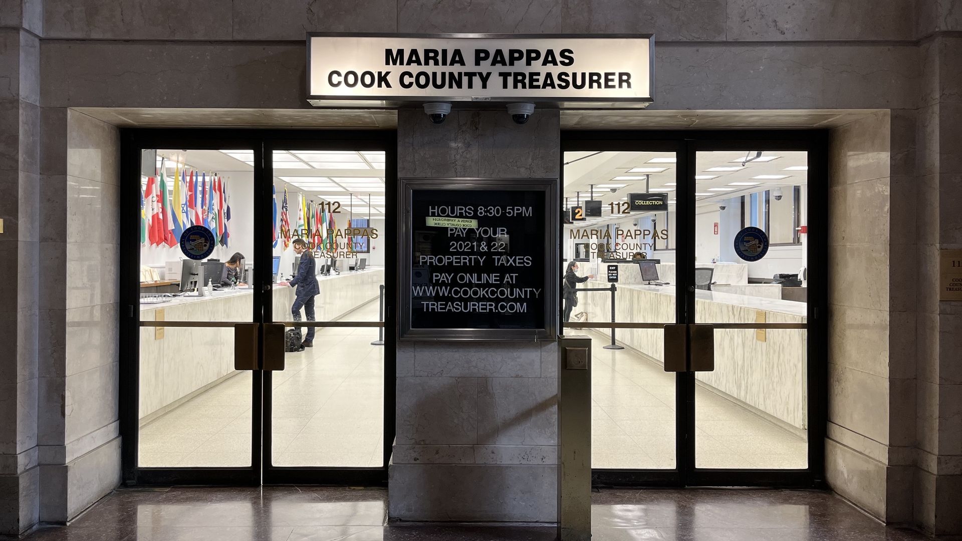 Two sets of a doors with a sign above that reads: Maria Pappas, Cook County Treasurer
