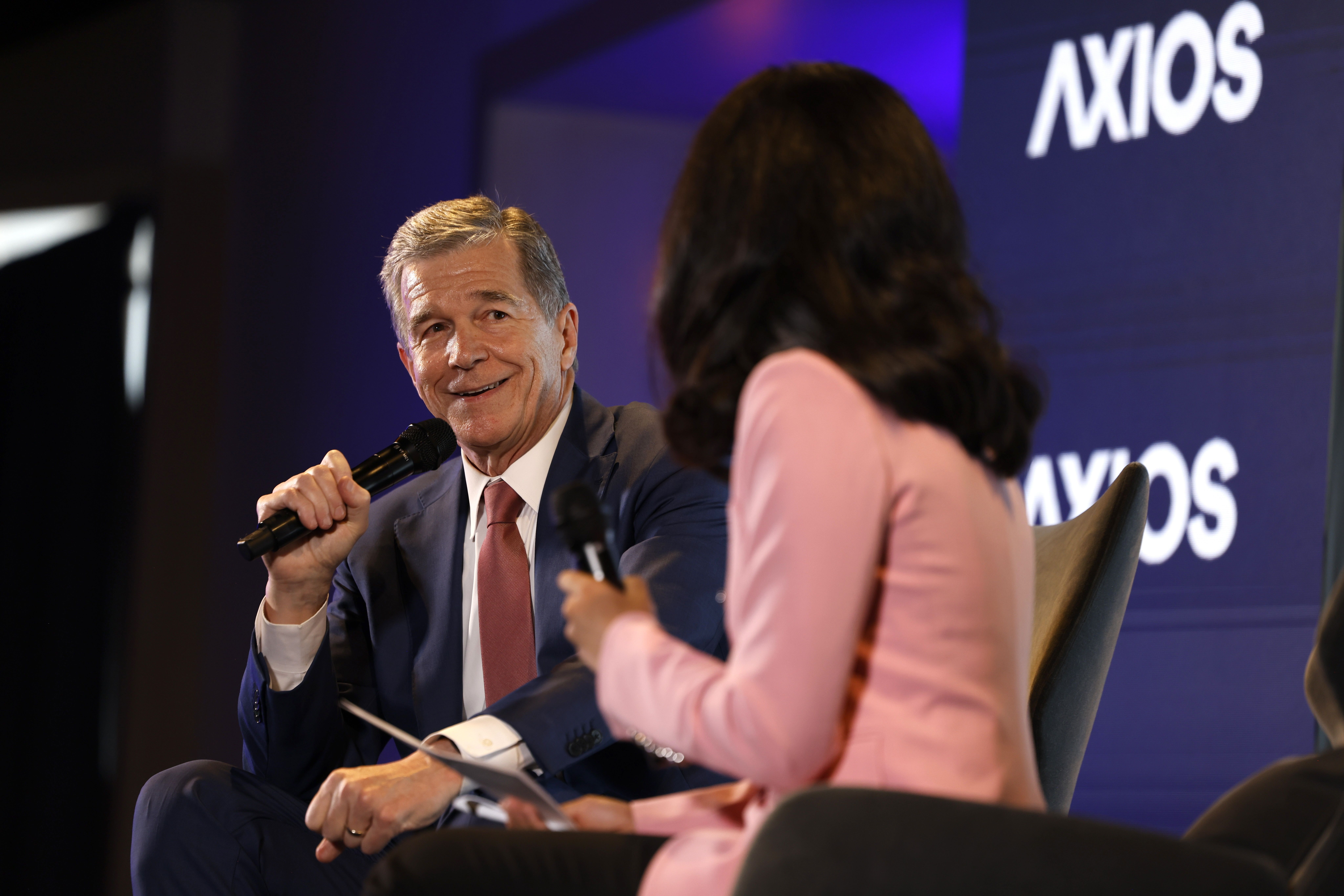 Axios' Sophia Cai interviews North Carolina Gov. Roy Cooper in Chicago yesterday.