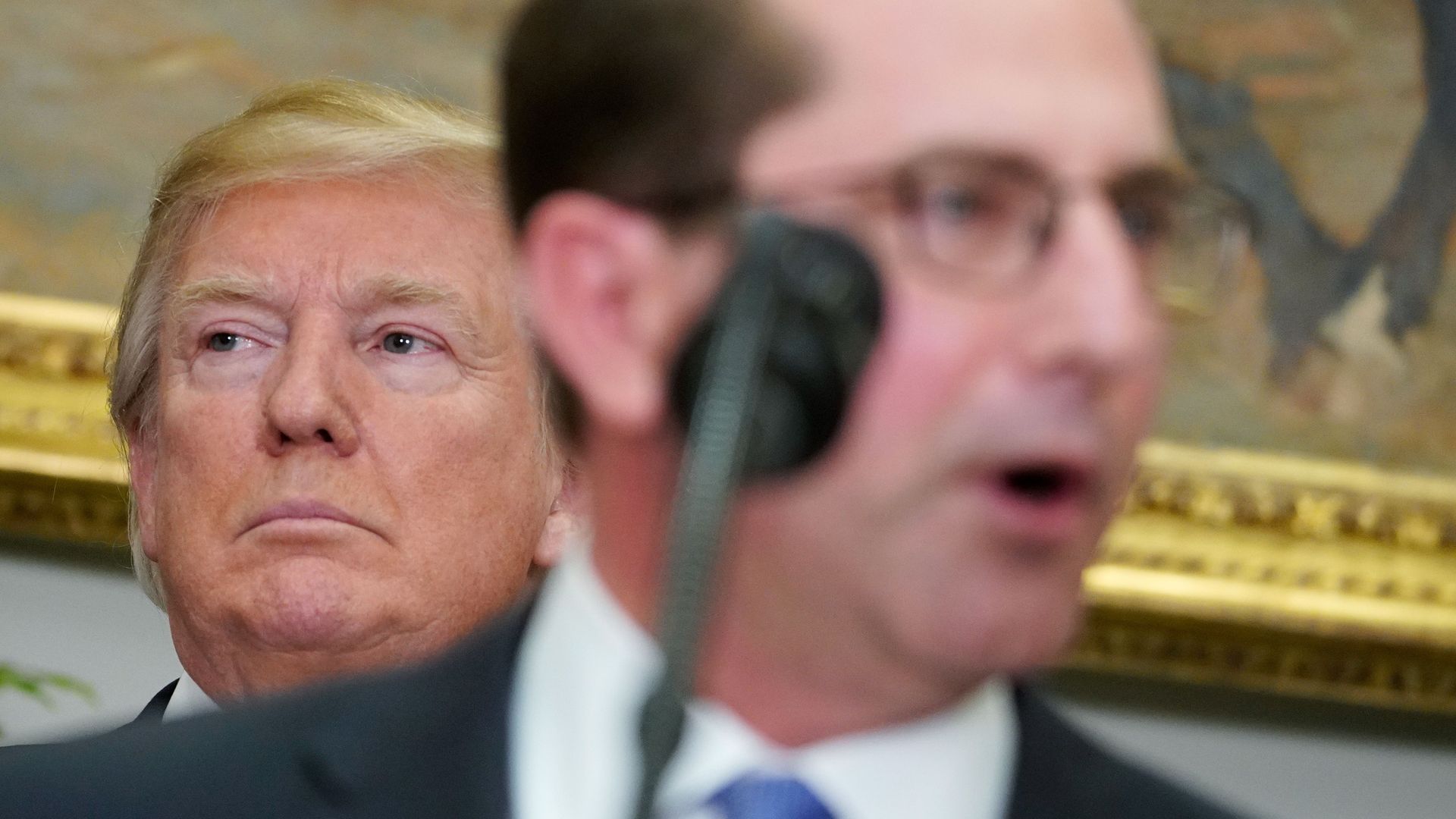 Health and Human Services Secretary Alex Azar speaks after taking the oath of office watched by US President Donald Trump 