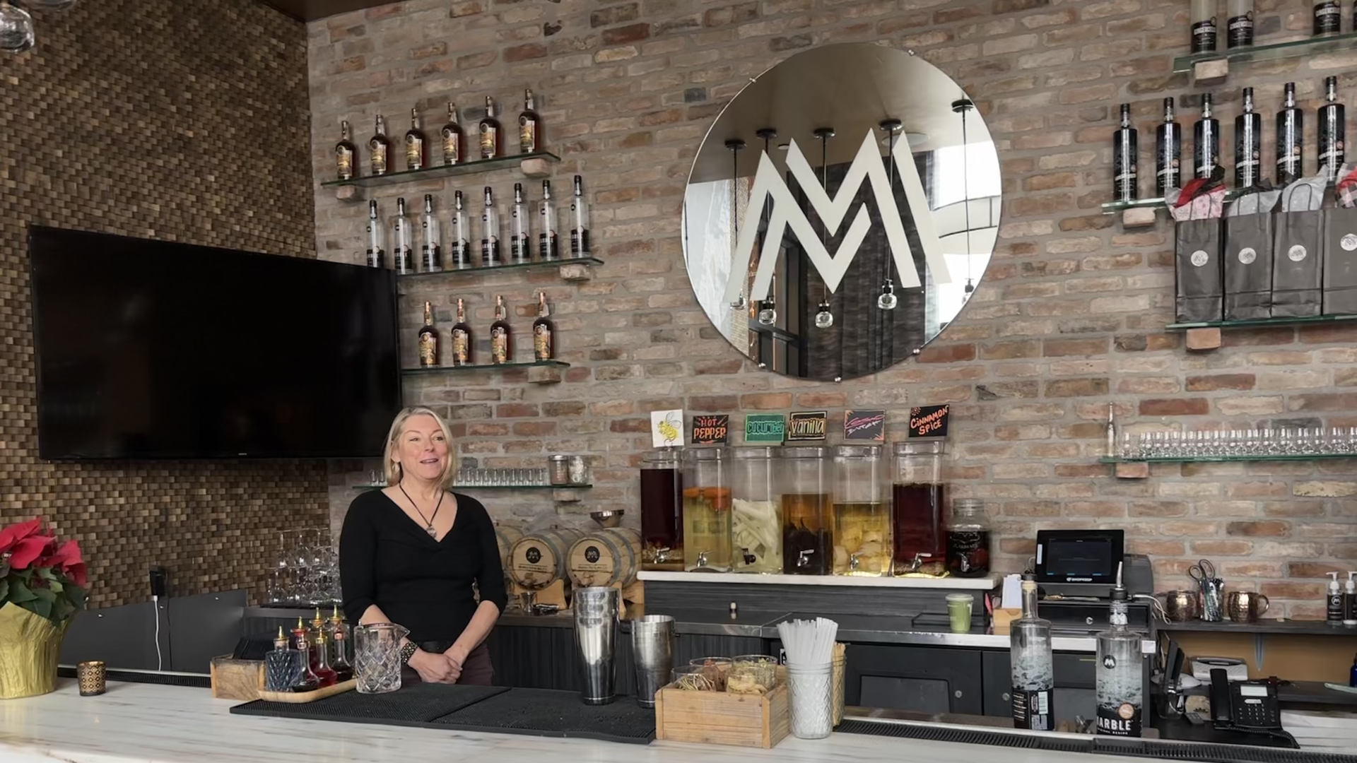 Connie Baker at the Marble Distilling bar in Carbondale. Photo: John Frank/Axios