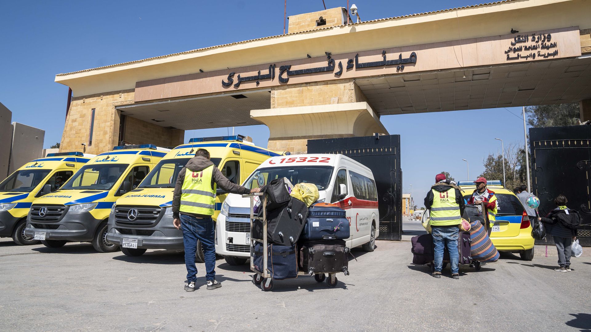 Palestinians walk to re-enter the Gaza Strip via the Rafah border crossing, on March 23, 2024 in Rafah, Egypt. (Photo by Ali Moustafa/Getty Images)