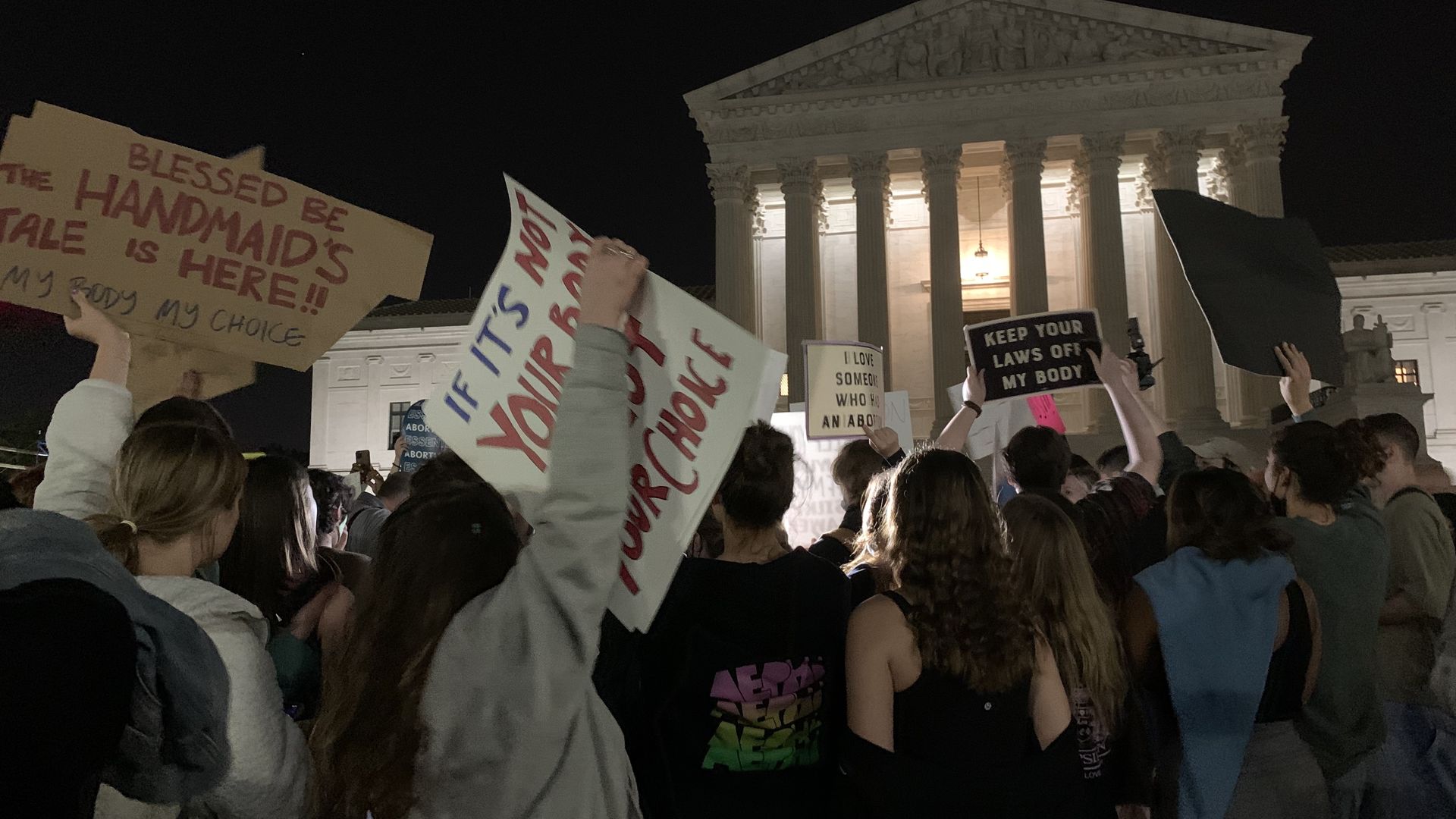 Pro-abortion rights protesters gather outside the Supreme Court late Monday.