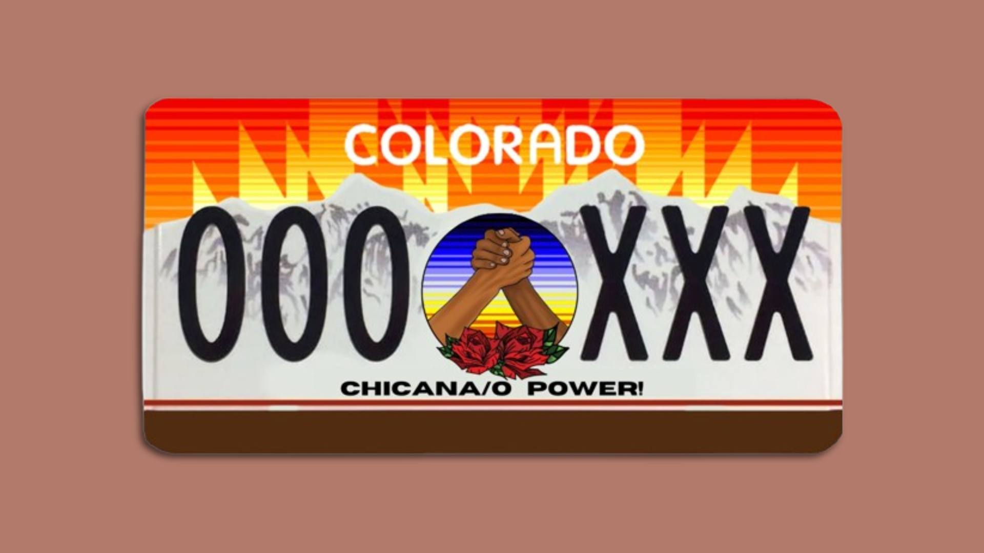 An illustration of an orange and brown Colorado license plate with two brown-skinned arms claps hands in the middle and "Chicana/o Power!" written underneath it.