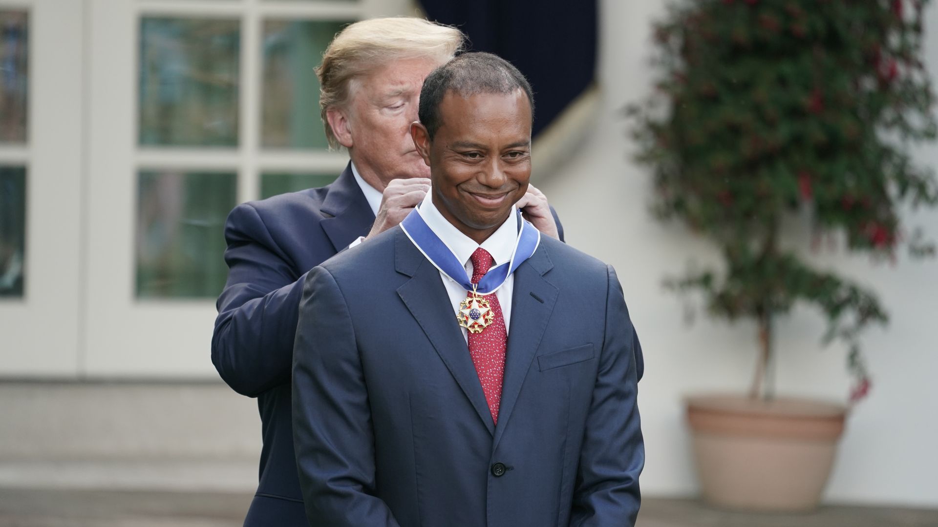 President Trump awards the Medal of Freedom to professional golfer Tiger Woods.