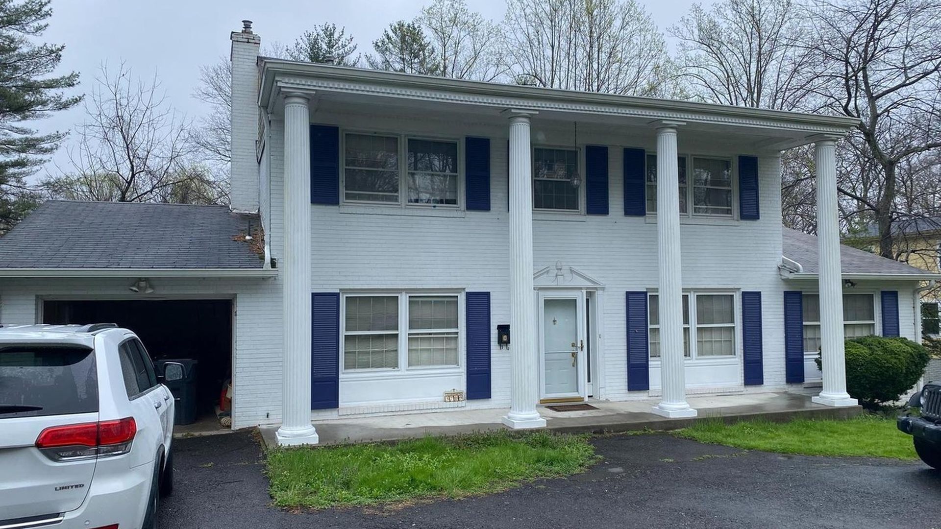 A white house with columns.