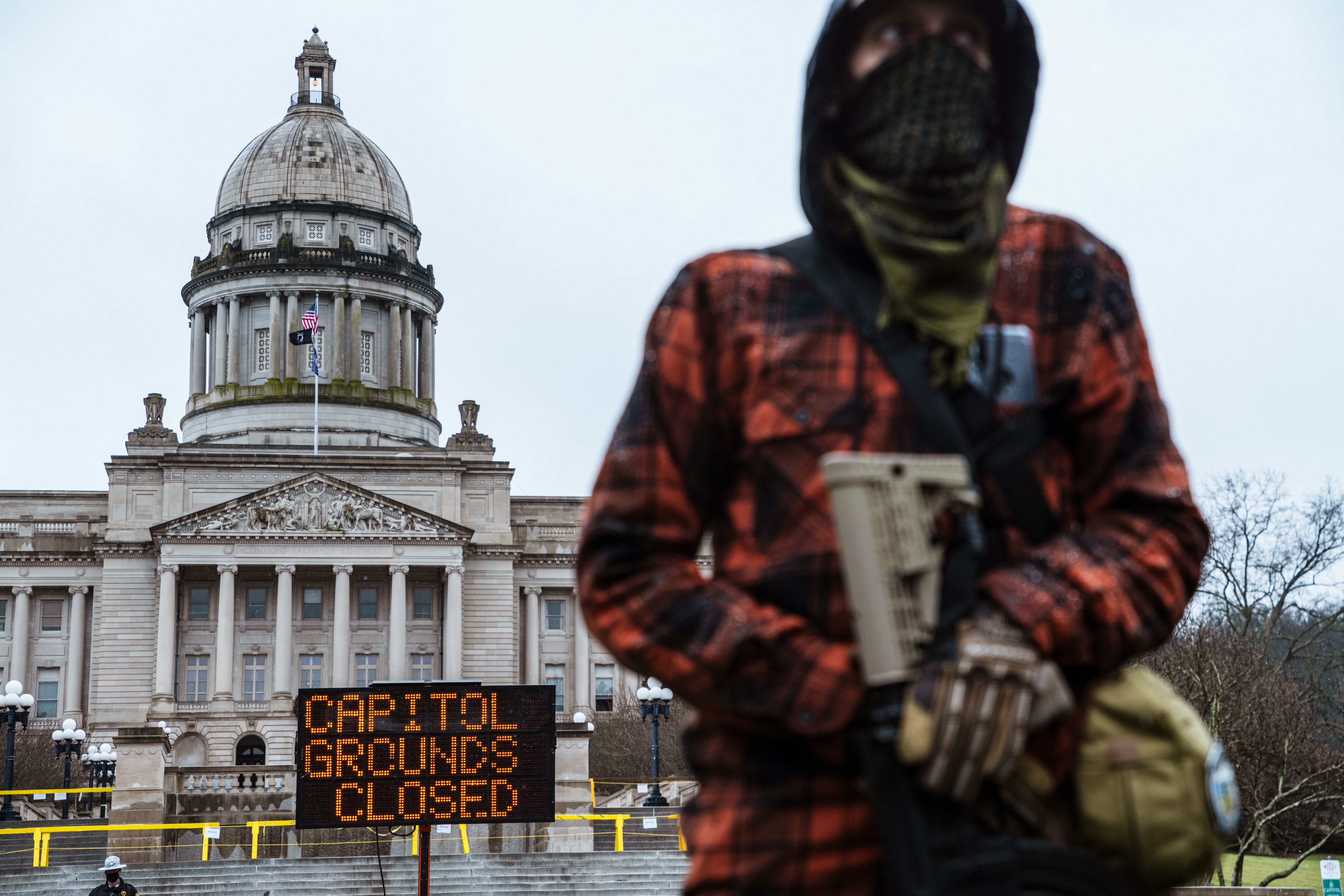 An armed member of the right-wing subsection of the militia coined the Boogaloo Boys protests outside of the Capitol on January 17, 2021 in Frankfort, Kentucky. 