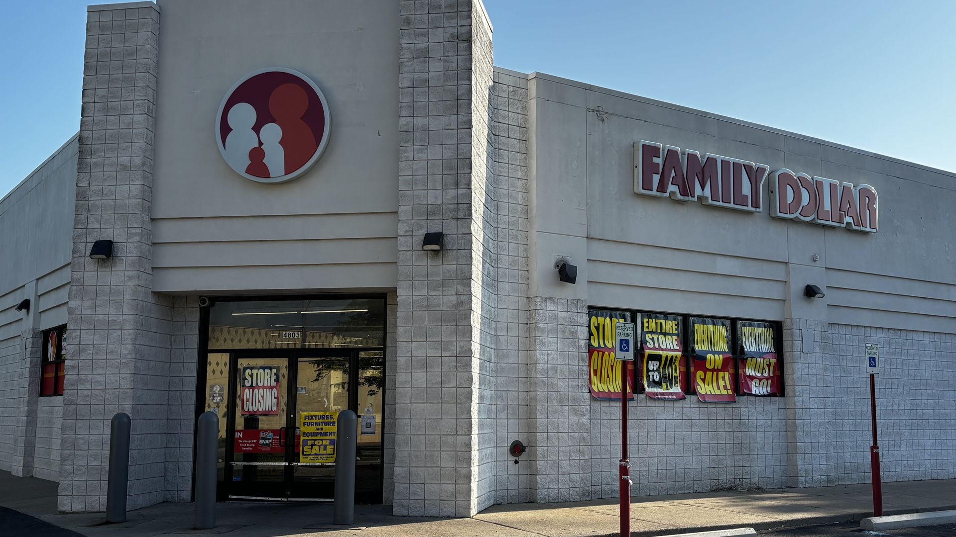 The Family Dollar on Eight Mile in Warren, with signs outside saying it's closing.