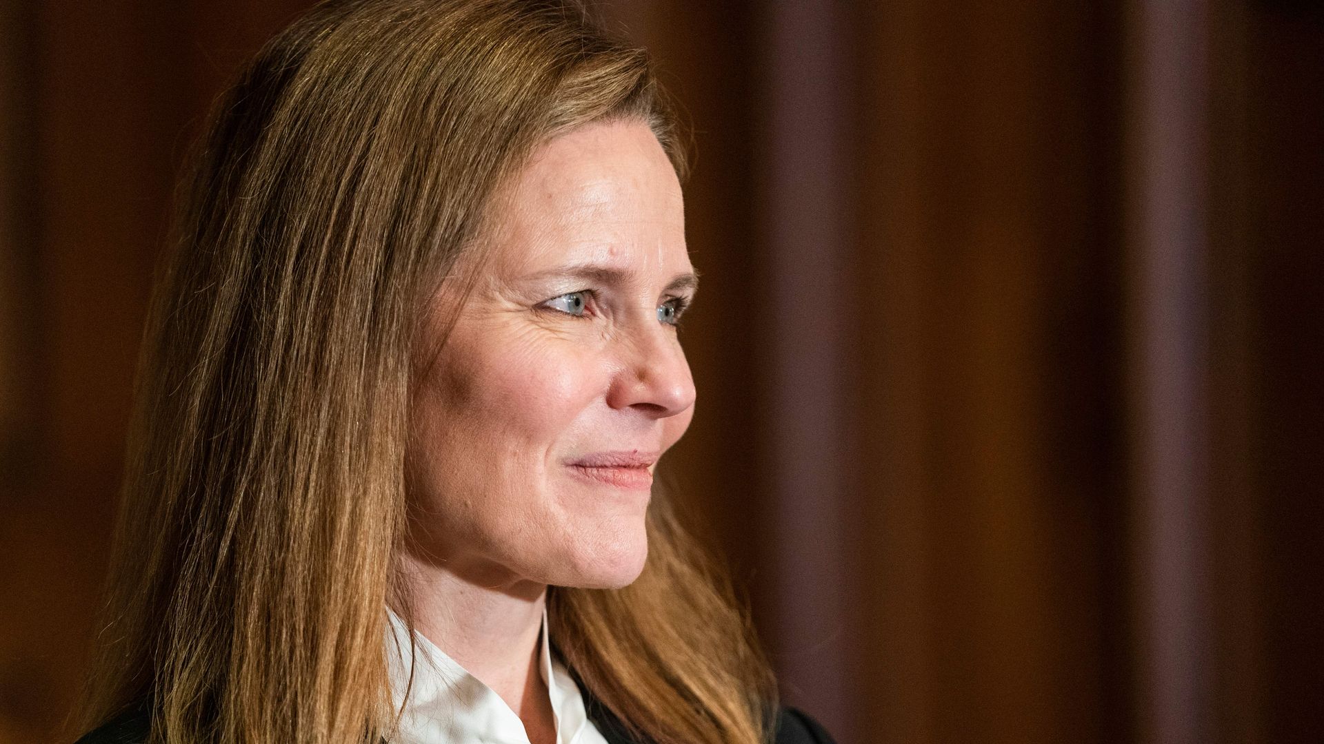 Judge Amy Coney Barrett smiles