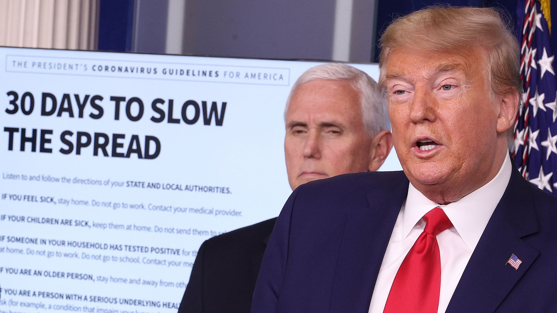 President Donald Trump speaks while flanked by Vice President Mike Pence during the daily coronavirus task force briefing in the Brady Briefing room at the White House on March 31