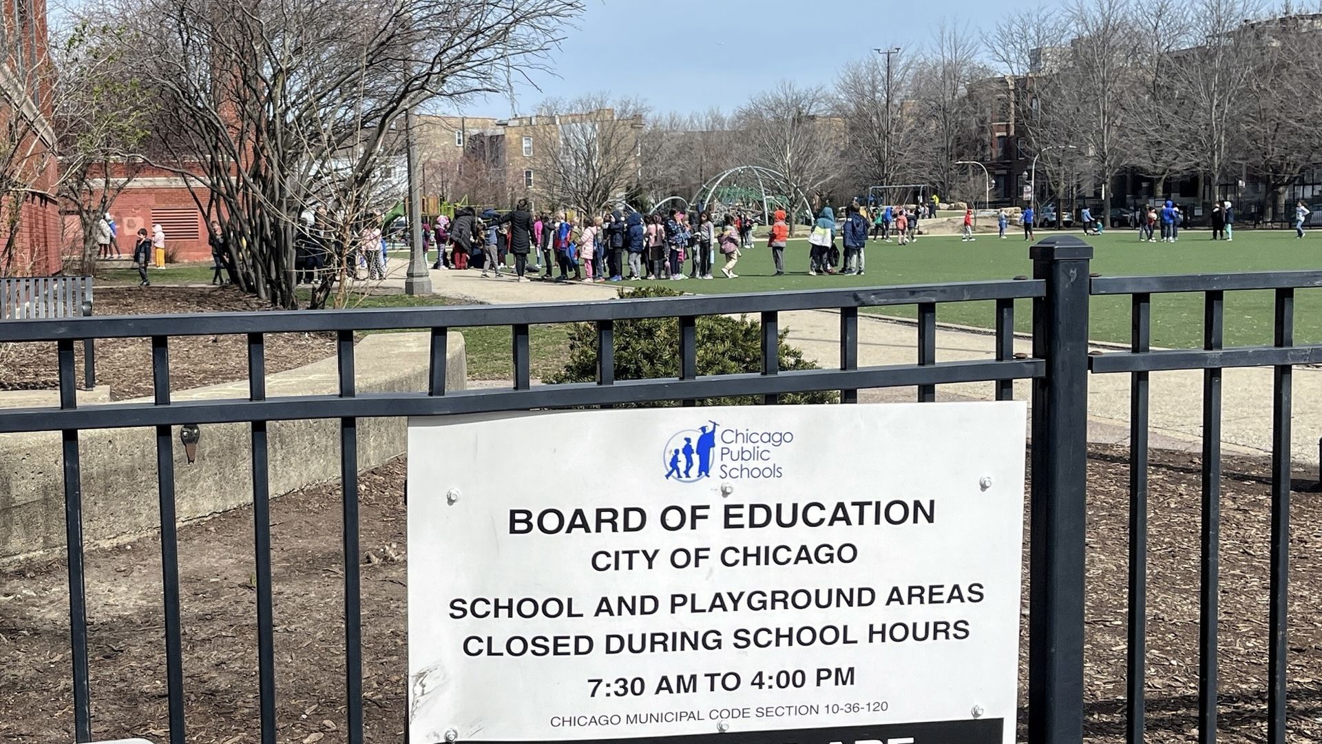 Photo of a sign outside a playground 