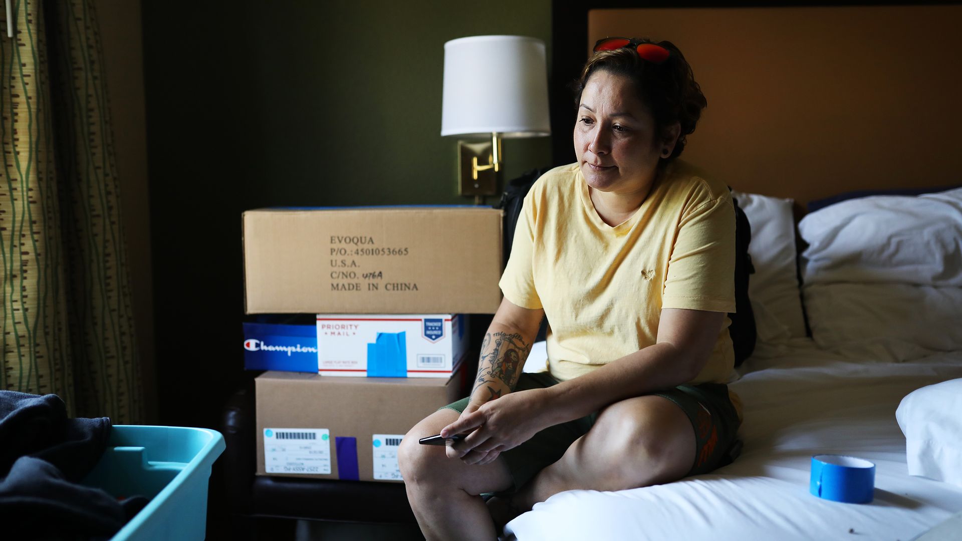 Dagmar Rivera in a hotel room in Tewksbury, MA, where she's been living since Hurricane Maria forced her from her home in Puerto Rico. Photo: Erin Clark/The Boston Globe via Getty Images