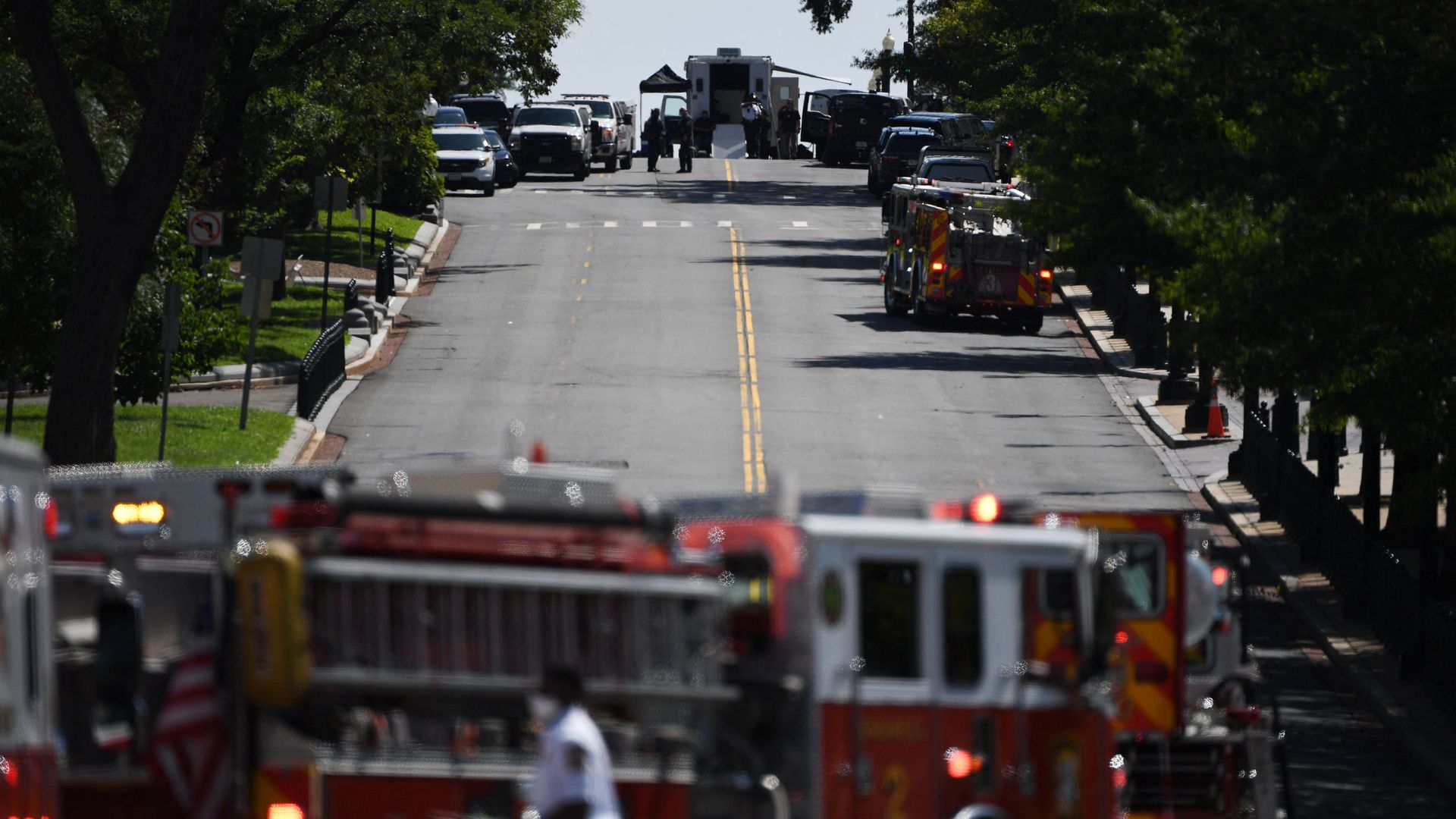 First responders and police investigate a possible bomb threat near the US Capitol 