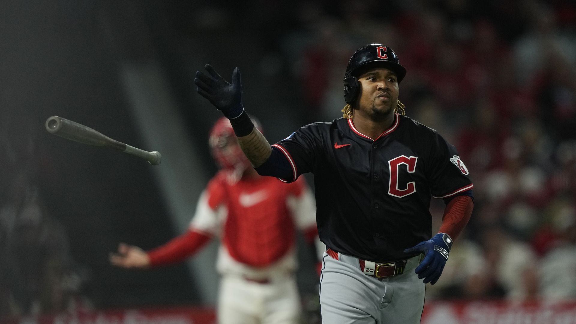 José Ramírez #11 of the Cleveland Guardians rounds the bases after hitting a two-run home run.