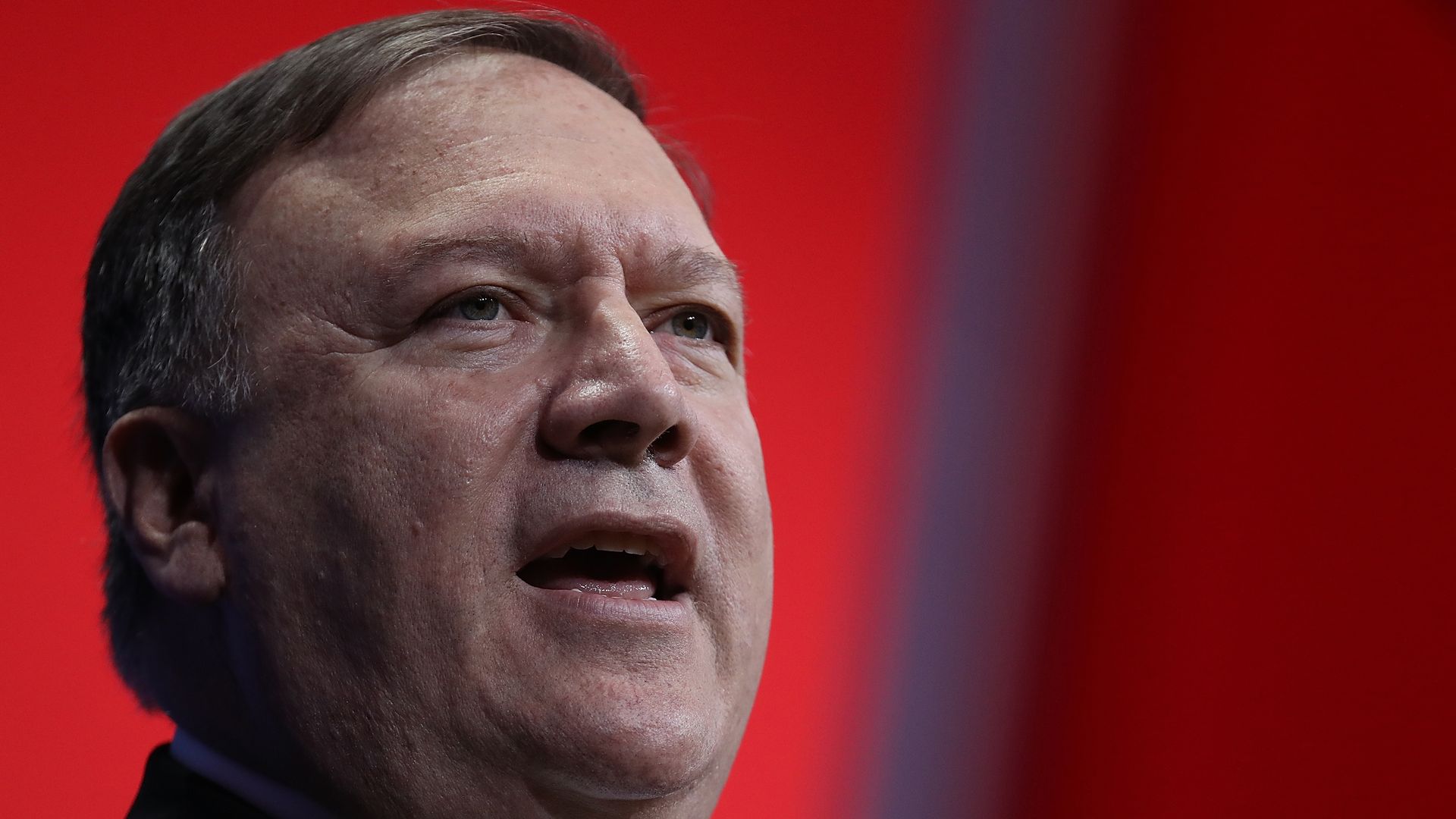 Mike Pompeo speaking at a summit