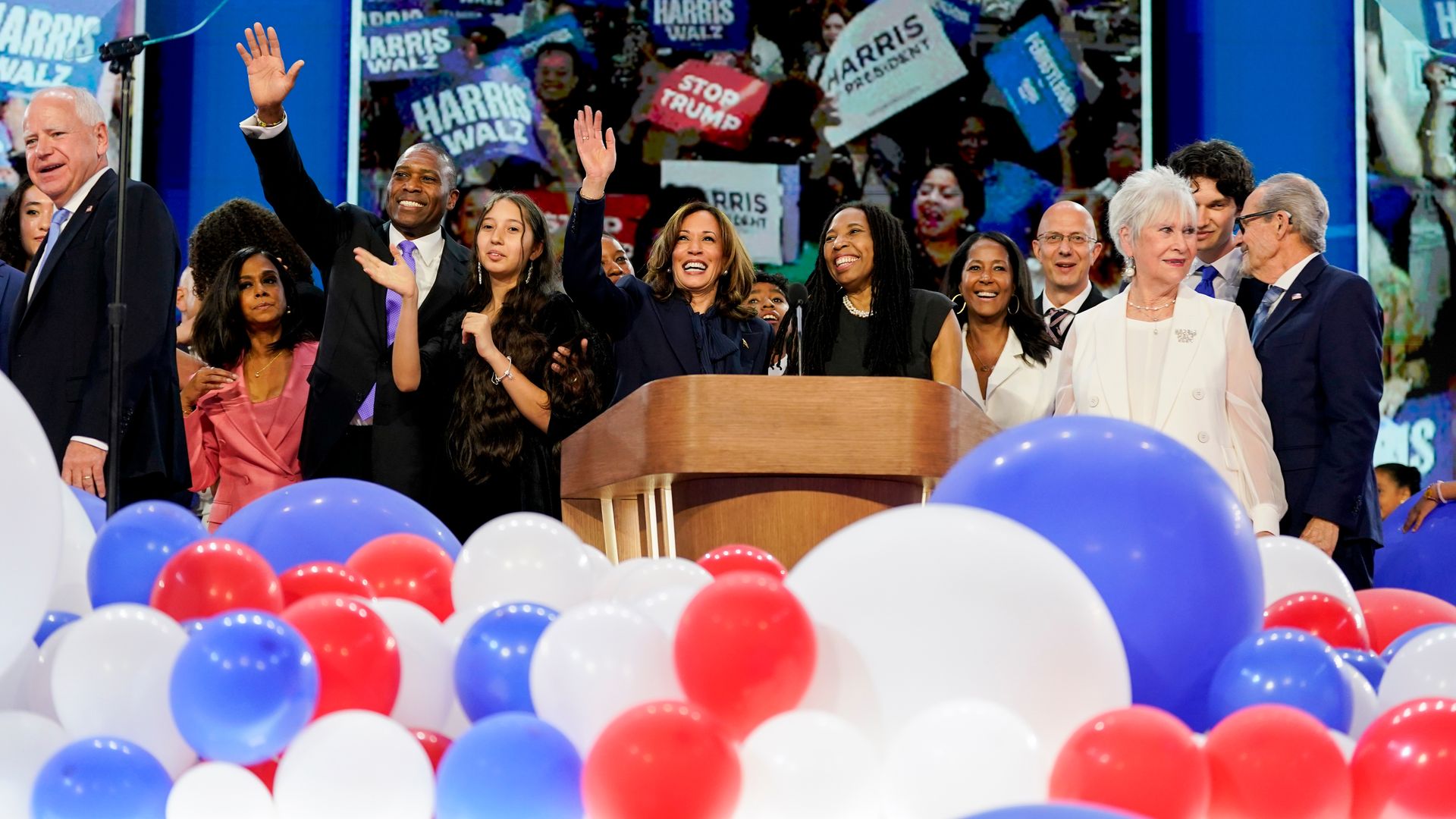 US Vice President Kamala Harris, center, following the ballon drop during the Democratic National Convention (DNC) at the United Center in Chicago, Illinois, US, on Thursday, Aug. 22, 2024.