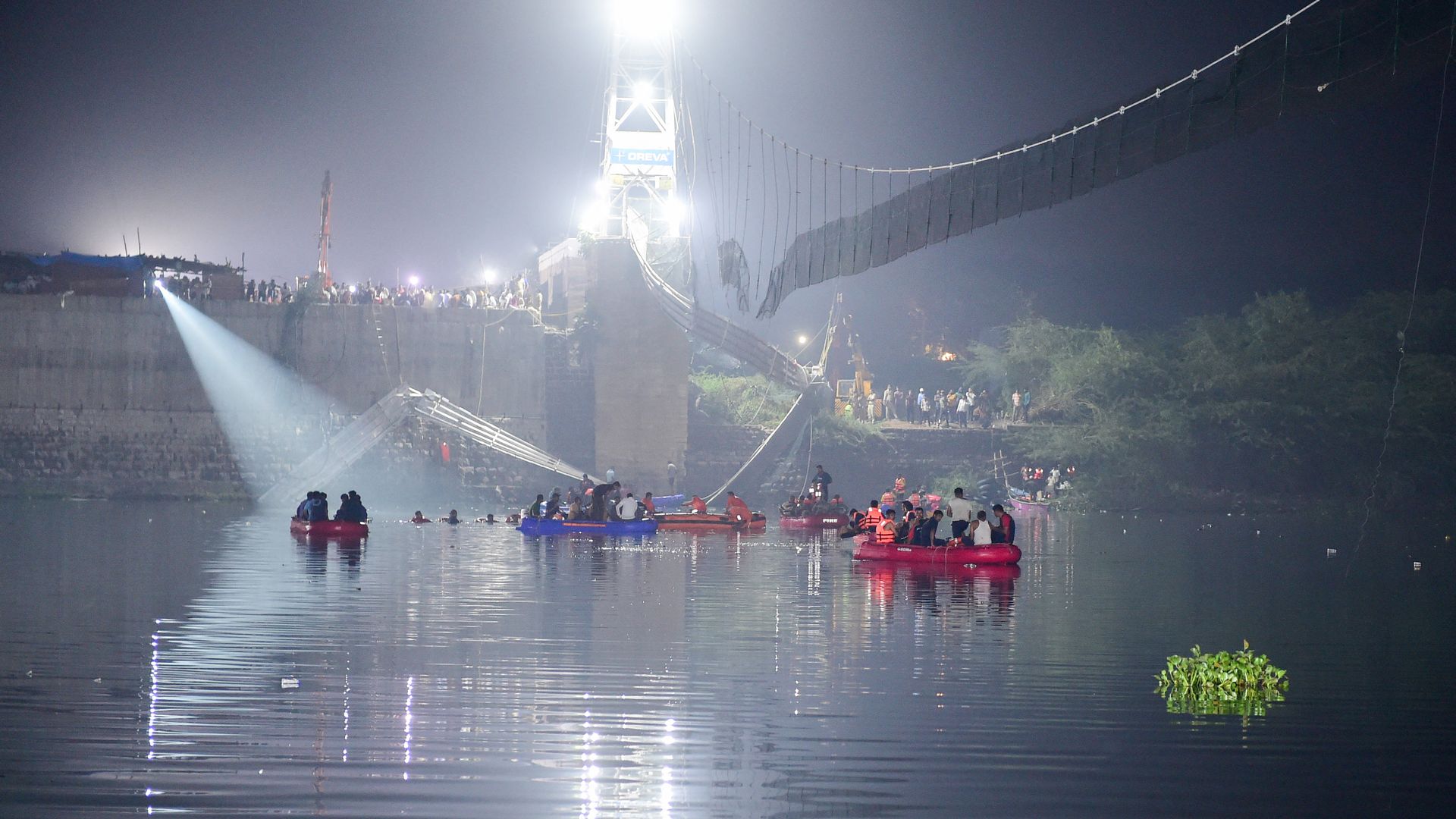 Search and rescue personnel conducting operations on the Machchhu River on Oct. 31 after the bridge collapse.