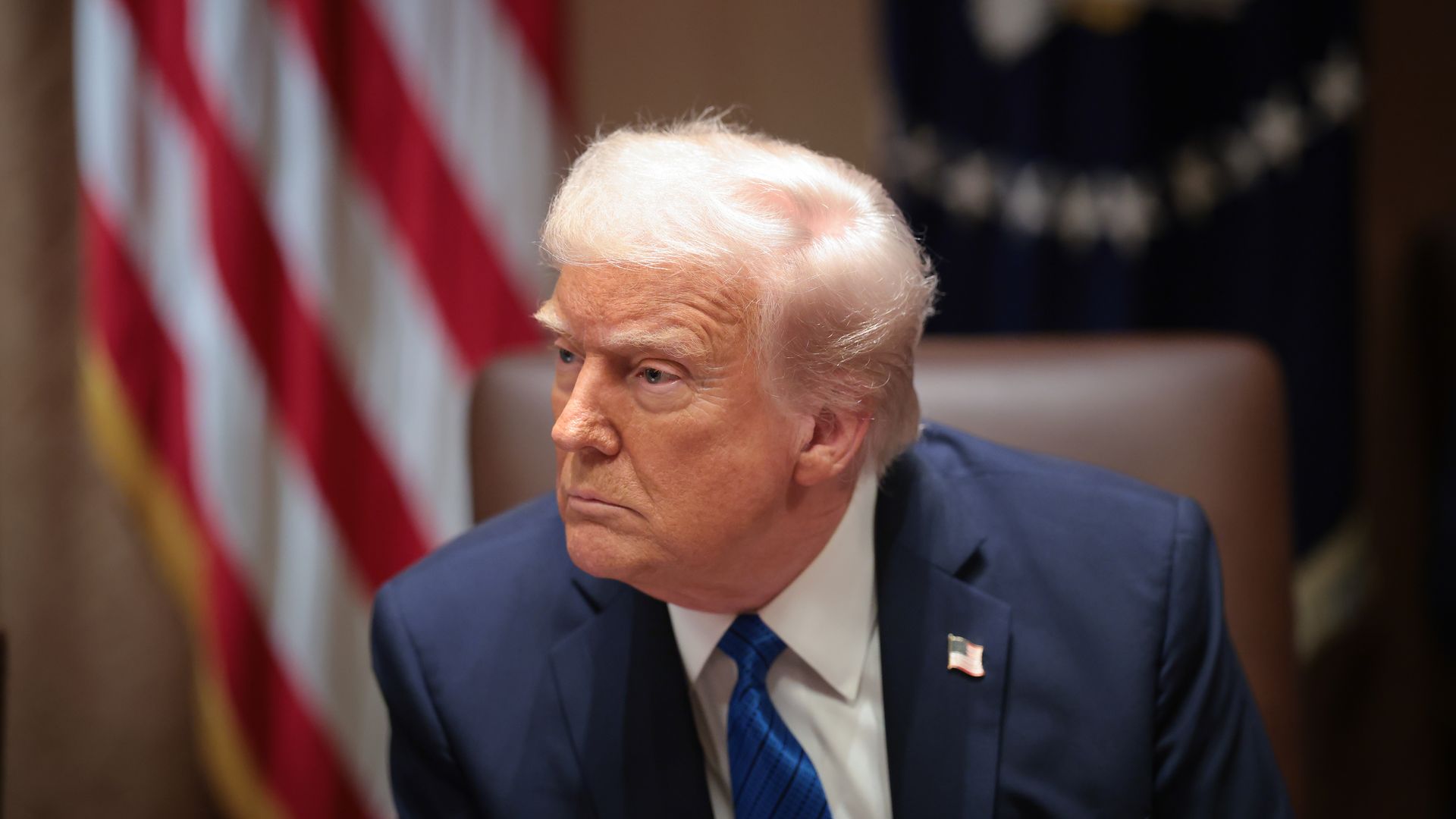 President Donald Trump listens to a reporter's question during an Ambassador Meeting in the Cabinet Room of the White House on March 25, 2025 in Washington, DC. During the meeting, Trump answered questions from reporters on the news that Jeffrey Goldberg, the editor-in-chief of The Atlantic magazine