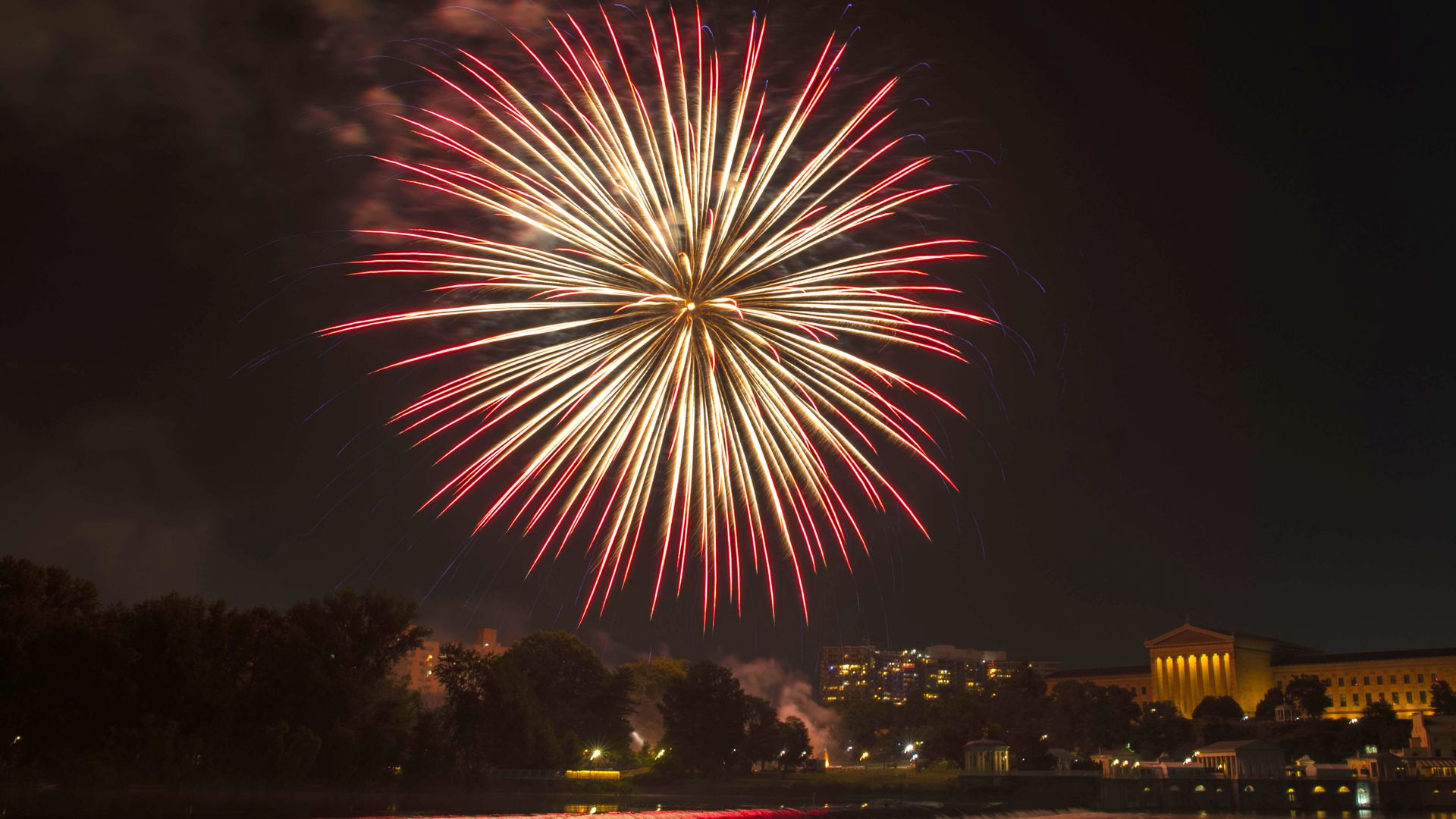 Independence Day fireworks erupt over the Philadelphia Art Museum.