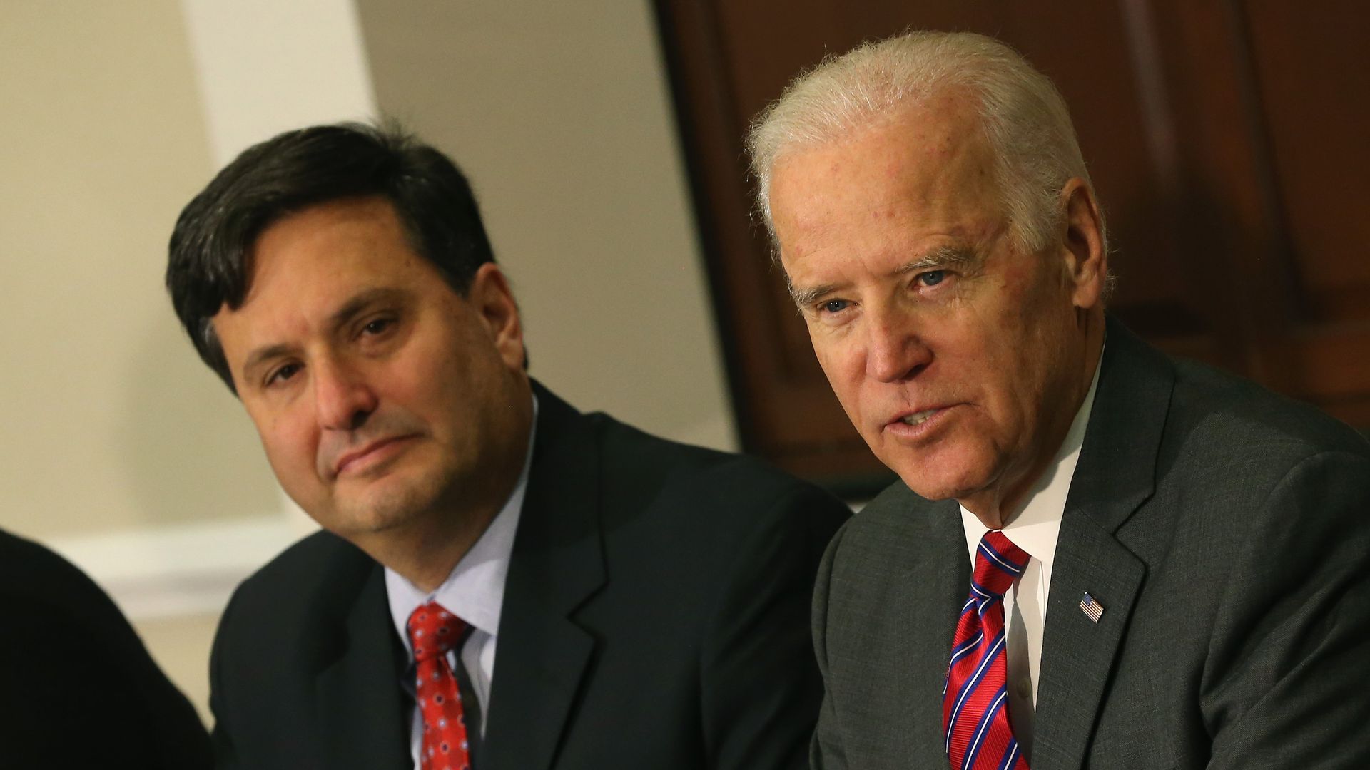 Vice President JoeBiden (R) joined by Ebola Response Coordinator Ron Klain (L), speaks during a meeting regarding Ebola at the Eisenhower Executive office building November 13, 2014