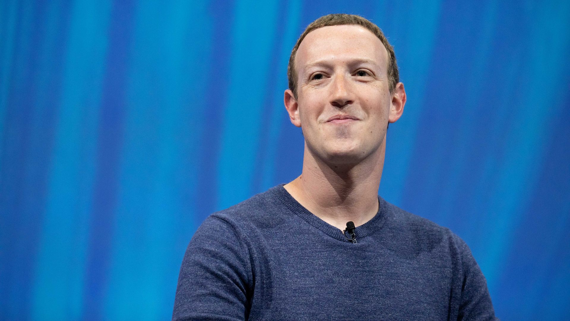 Facebook CEO Mark Zuckerberg with a half-smile on his face