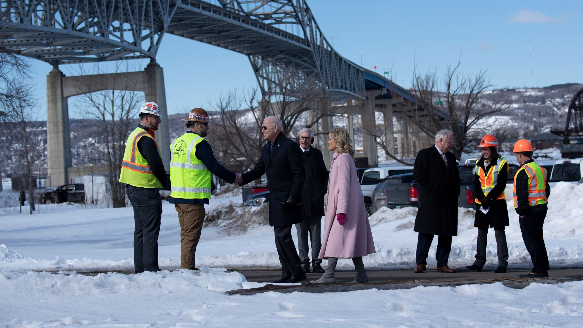 President Joe Biden and First Lady Jill Biden visit workers near the John A. Blatnik Memorial Bridge in Superior, Wisconsin, on March 2, 2022. Photo by BRENDAN SMIALOWSKI/AFP via Getty Images