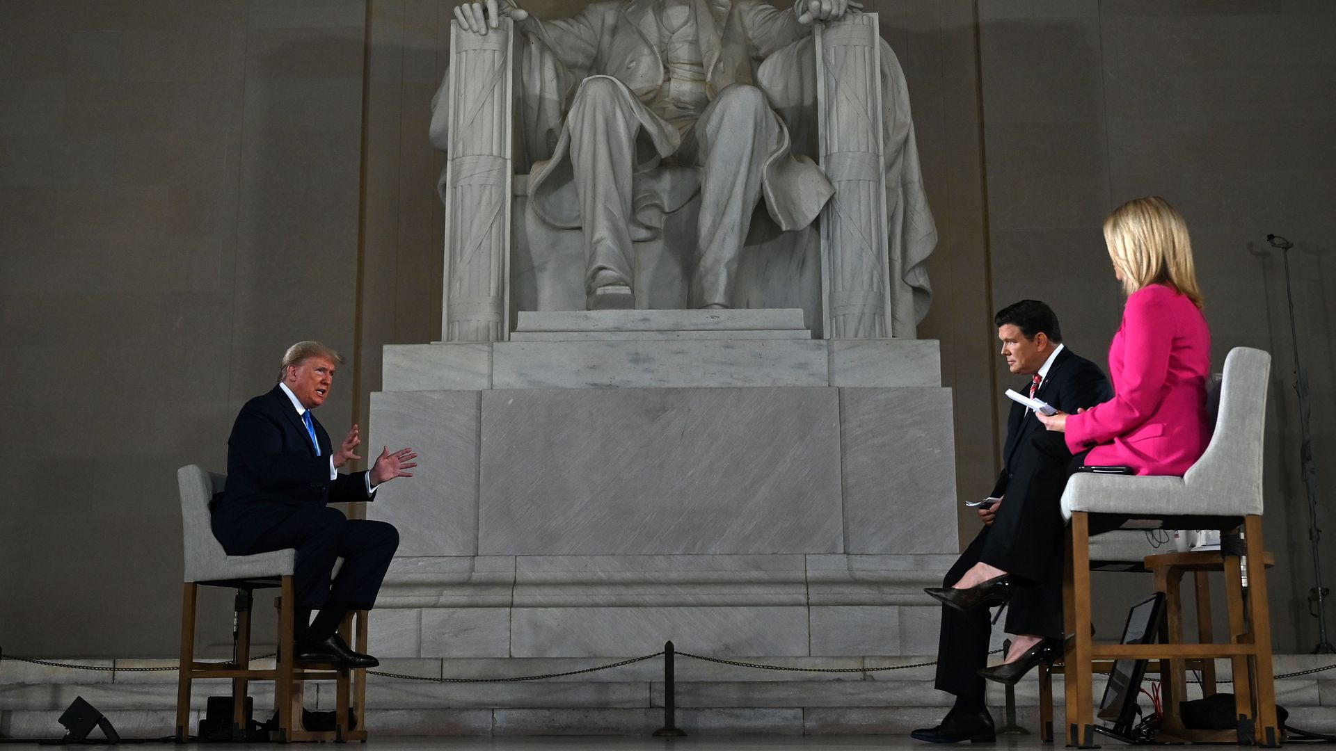 US President Donald Trump speaks during a Fox News virtual town hall "America Together: Returning to Work," event, with anchors Bret Baier and Martha MacCallum from the Lincoln Memorial