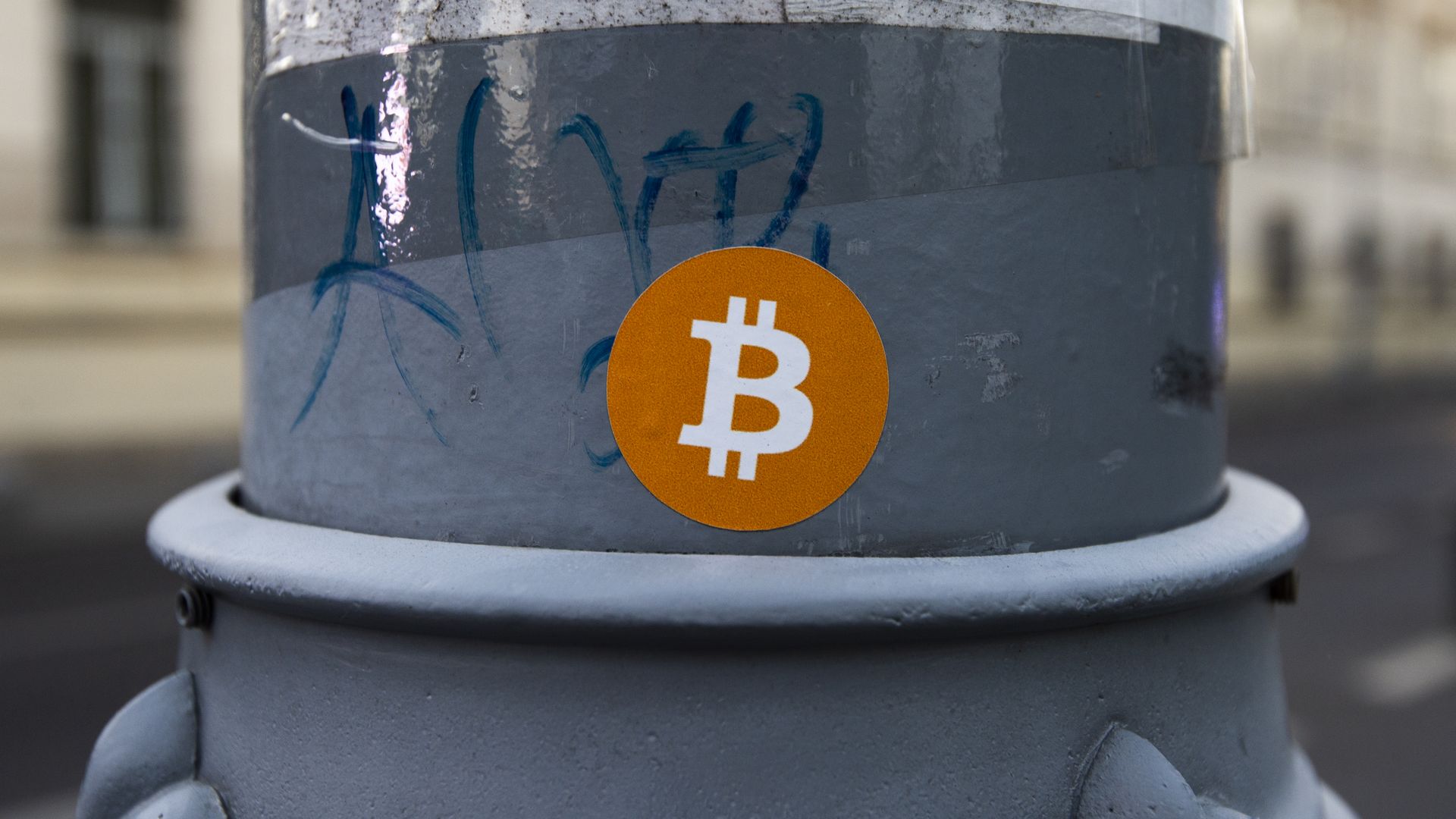 Bitcoin sticker on a telephone pole