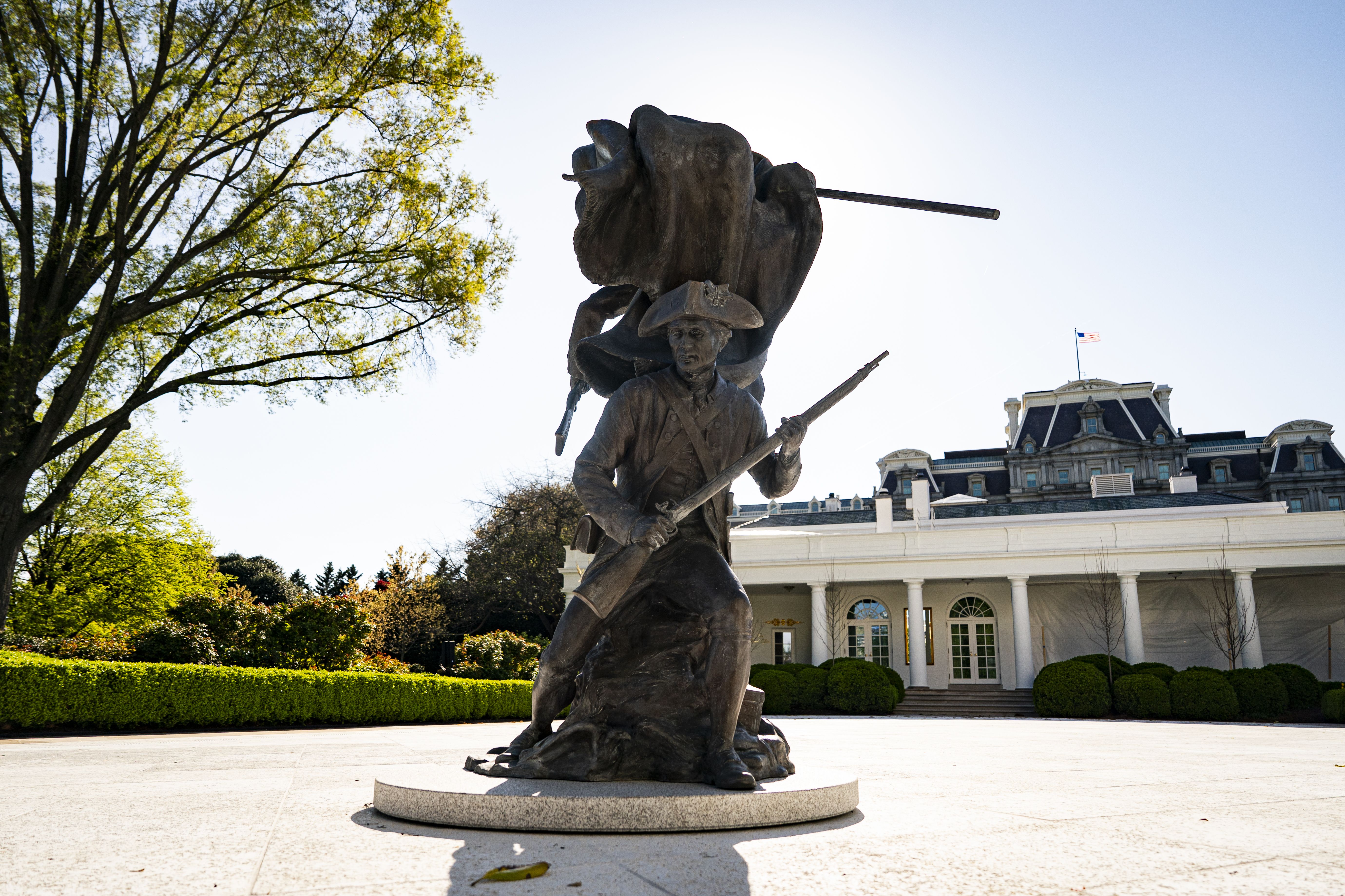 "Freedom's Charge," a bronze sculpture by Chas Fagan, depicting the Revolutionary War, stands in the Rose Garden of the White House.