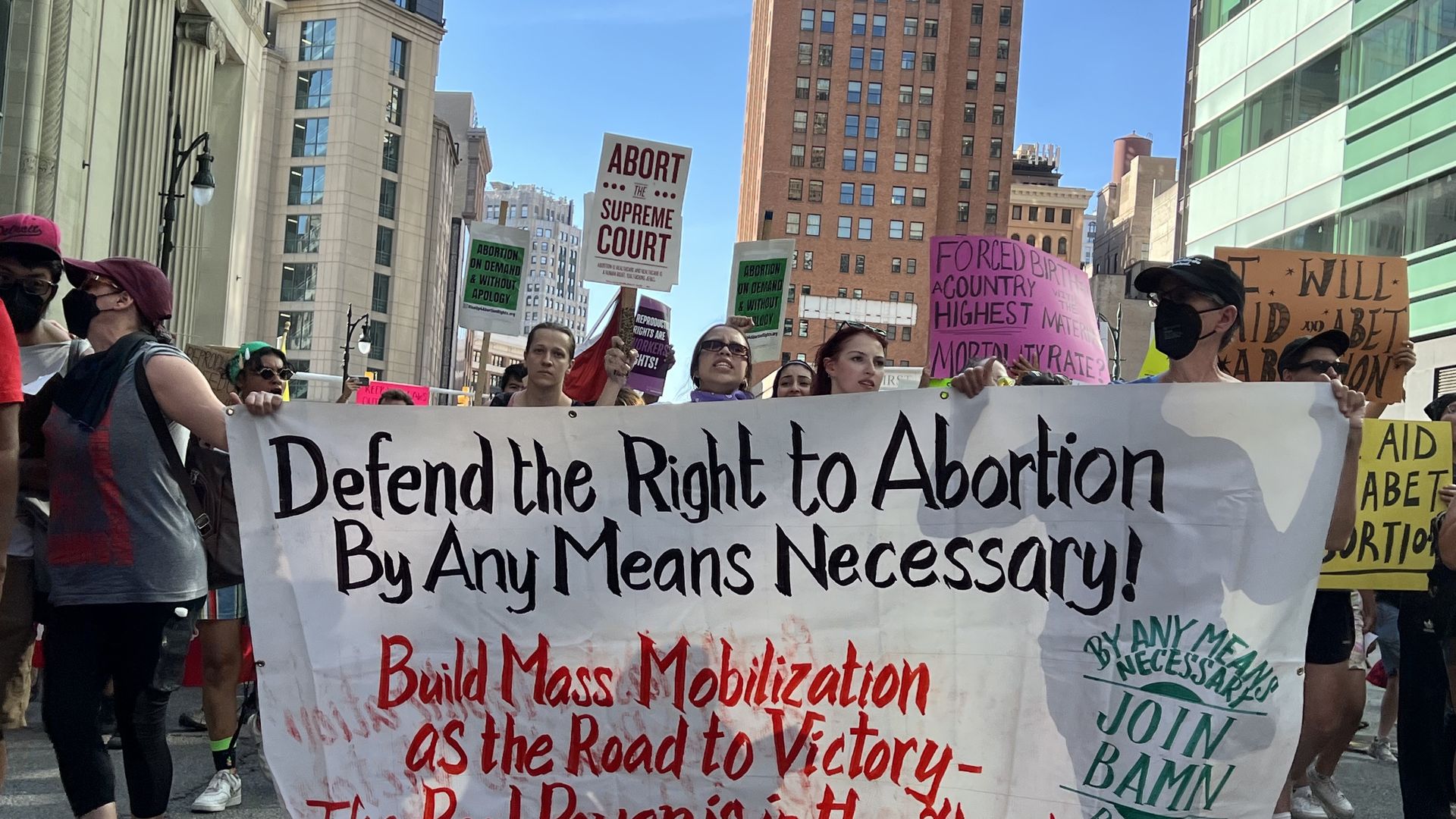 Abortion advocates march down Griswold Street in downtown Detroit on June 24