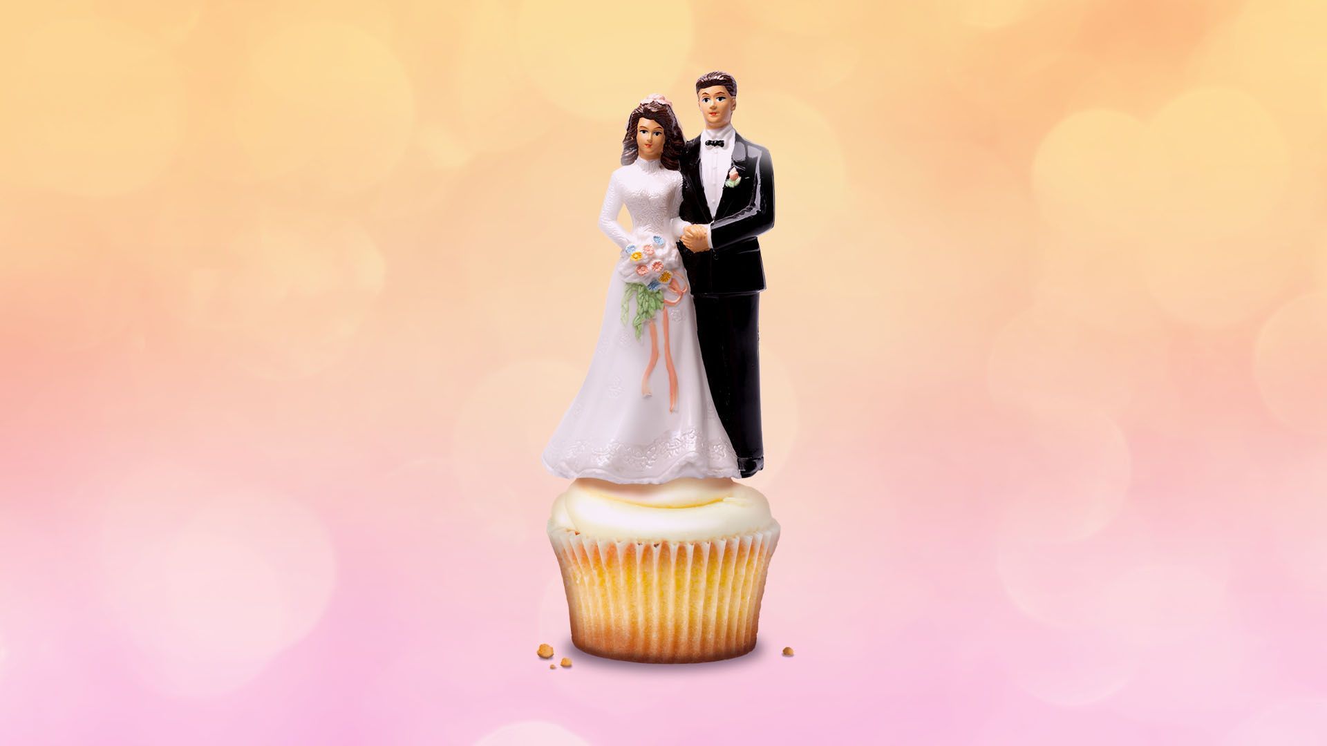 Illustration of a wedding cake topper bride and groom on top of a tiny cupcake