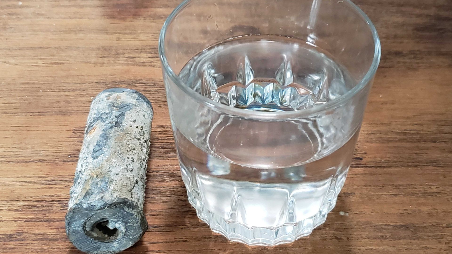 lead pipe and water glass